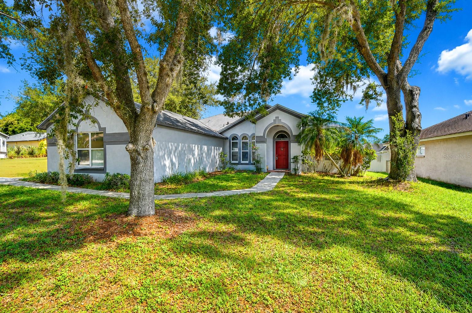 Located on a spacious corner homesite in the desirable Copper Ridge community, this 3-bedroom, 2-bath home offers a fantastic floor plan, generous living spaces, and endless potential for its next owner. While the home is ready for someone to add their personal touch, many of the major improvements have already been completed, including a new roof (2021), HVAC system (2021), water heater (2024), and pool pump (2024), providing peace of mind for years to come. Inside, you'll find formal living and dining rooms, a spacious family room, and an oversized kitchen with abundant cabinetry, a large pantry, and plenty of workspace. The split-bedroom floor plan provides privacy, while the expansive primary suite features a walk-in closet and a spacious en-suite bath. One of the home's standout features is the screened lanai overlooking the saltwater pool, creating the perfect foundation for an incredible outdoor living space. The fully fenced backyard is enclosed by a 6-foot privacy fence, offering plenty of room to relax, entertain, or enjoy outdoor activities. An oversized corner lot and 3-car garage provide even more flexibility and storage. Additional features include an oversized attic with pull-down stairs, an irrigation system, built-in garage shelving, a security system, and abundant storage throughout. Ideally located near shopping, dining, parks, and major commuter routes, this home presents a wonderful opportunity for buyers looking to personalize a home in one of Valrico's established neighborhoods while benefiting from several significant system updates already in place.
