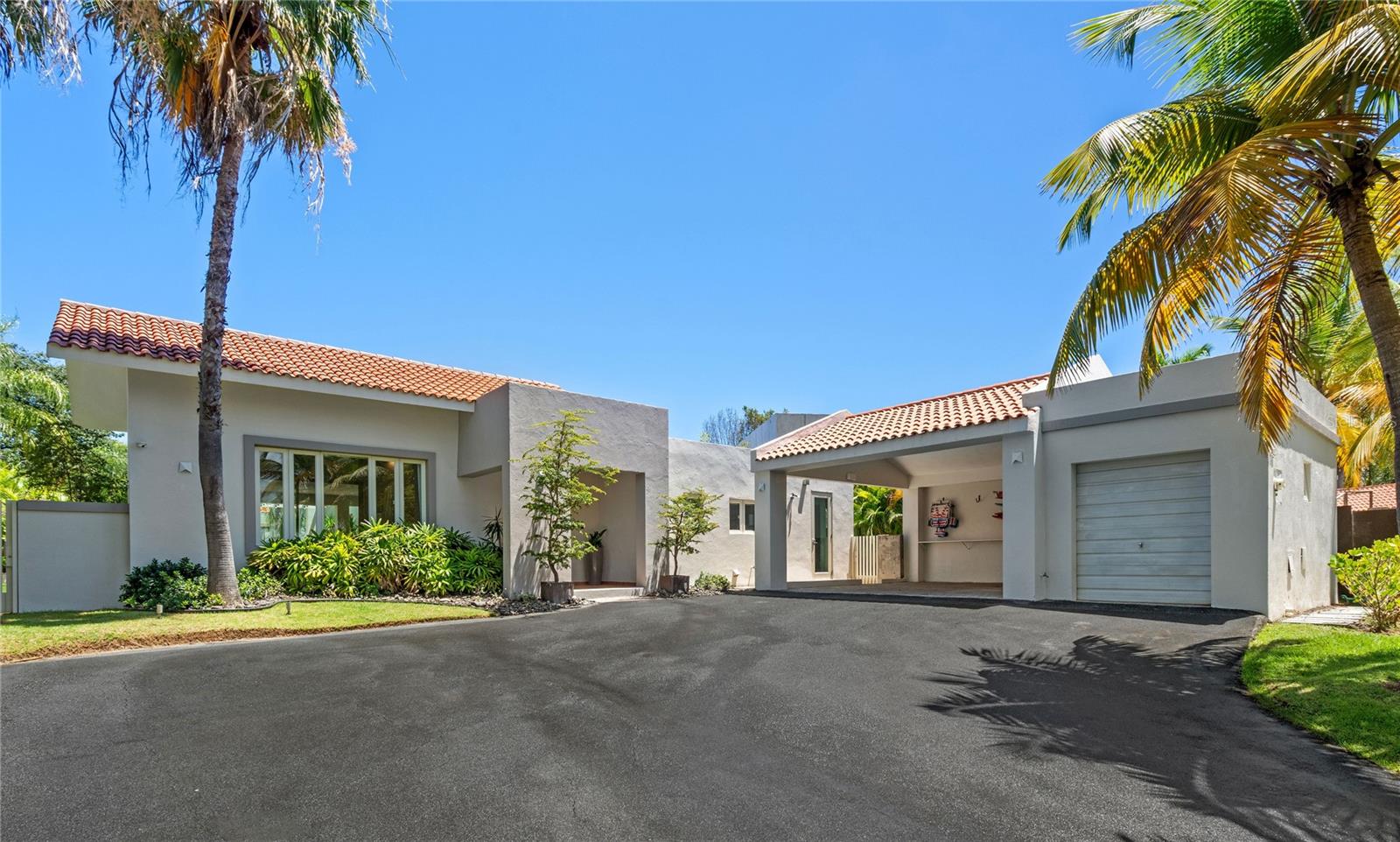 Welcome to this bright and spacious one-story residence, offering approximately 3,100 square feet of luxurious living on a generous 1,175 square meter lot. Designed for both comfort and entertaining, the open-concept kitchen provides ample space for hosting unforgettable gatherings. This exceptional property features three bedrooms, each with its own en-suite bathroom and walk-in closet.

Conveniently located near the South Gate of Dorado Beach East, the home boasts elegant, high-quality windows and doors throughout. The primary suite offers high ceilings and french doors that open to the outdoor spaces. Situated on an elevated lot with excellent drainage, the property ensures a secure and peaceful environment. It also includes a sparkling pool, a covered terrace, and an outdoor BBQ area—perfect for alfresco dining and relaxation.

Don’t miss the opportunity to own this piece of paradise. Contact us today to schedule a private tour!

Featured Amenities
BBQ Area
Covered Terrace
Exterior Lighting
Furnished
Laundry Appliances
Pool & Jacuzzi
Power Generator
Solar Water Heater
Stainless Steel Appliances
Water Cistern
AC Unit Available in Golf Cart Garage
Electric Water Heater
Wine Fridge
220 Plug Available for Charging Electric Car