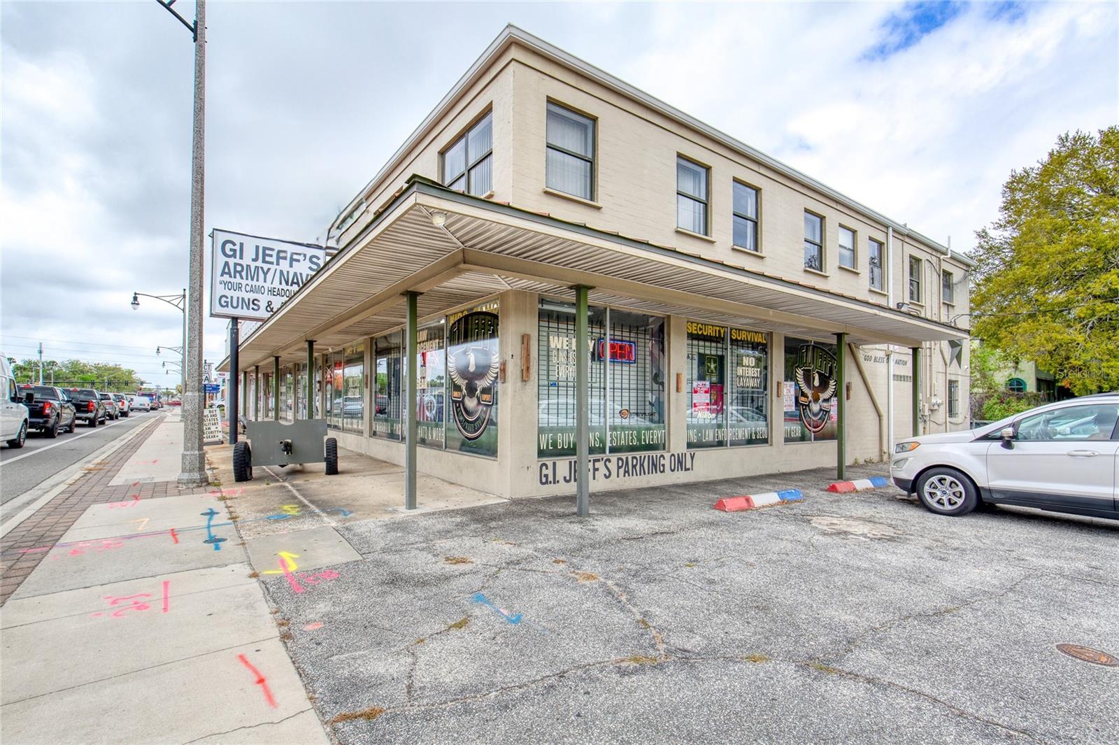 Prime Commercial Opportunity – High-Exposure Commercial Property located right down the road from the Daytona International Speedway! 
Exceptional opportunity to own a well-established gem in the heart of Daytona Beach, just off International Speedway Boulevard with convenient access to I-95 and minutes from the beach. This high-visibility location benefits from steady local traffic as well as a strong flow of tourists year-round.
This property includes 8,237 SqFt of possibilities and a 1Bed, 1Bath apartment located on the second floor. Offering a flexible floor plan suitable for retail, service, or specialty use, making it ideal for investors, owner-operators, or redevelopment strategies. Currently operating as a surplus retail store, offering a wide range of inventory including ammunition, military-style clothing, outdoor gear, tactical equipment, firearms, and accessories. The business is fully operational and presents a turnkey opportunity for an investor or owner-operator.
This offering is flexible and can be structured to suit a variety of investment needs. The Building and Land can be purchased alone for $850,000, or Acquire the existing retail operation with active cash flow, established branding, operational systems already in place and loyal clientele for an additional $350,000. Totaling $1,200,000. 
With its strategic location, established customer base, and versatile purchase options, this property is ideal for entrepreneurs looking to step into a ready-made retail operation or investors seeking a valuable commercial asset in a thriving coastal market.
Don’t miss the chance to secure a unique and profitable business opportunity in one of Florida’s most recognized destinations.

*Some exterior photos have been altered and or enhanced to remove billboard signage*