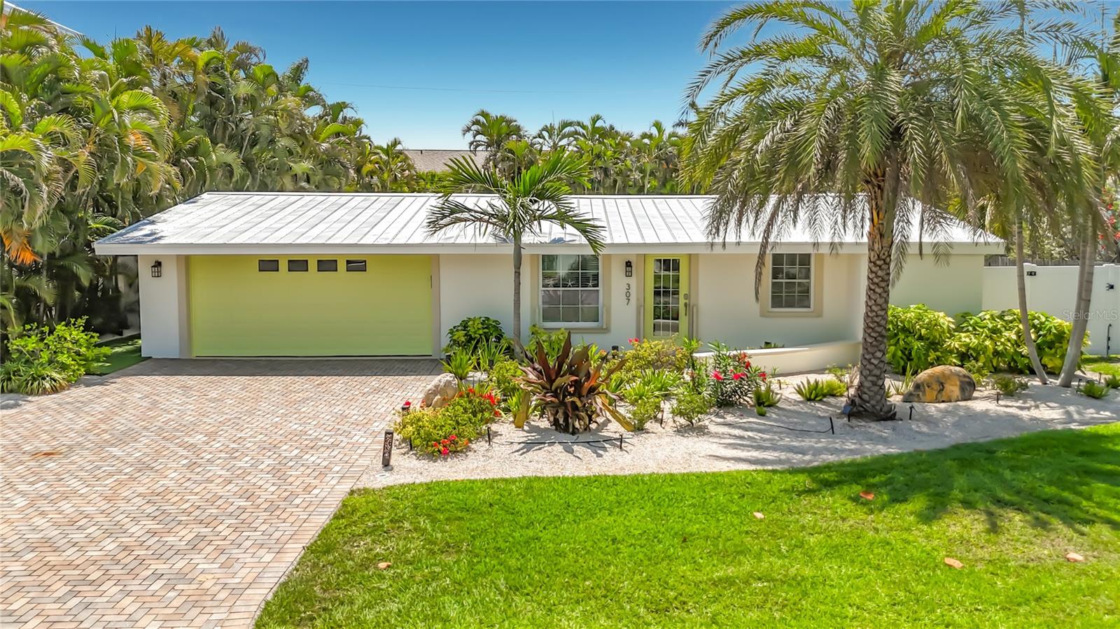 Experience refined coastal living in Holmes Beach. This exceptional turnkey 3BR/2.5BA residence showcases impressive curb appeal with pristine landscaping that sets the tone from the moment you arrive.
Inside, you’ll find an expansive, light-filled interior with an open-concept design that seamlessly blends comfort and sophistication, ideal for both elevated everyday living and upscale entertaining.
The private outdoor retreat is equally impressive, featuring a spacious turf backyard and a resort-style pool, offering a low-maintenance yet luxurious setting with ample room for lounging, dining, and hosting under the Florida sun. With no HOA, enjoy the rare convenience of generous space to accommodate a boat or RV, perfect for embracing a true island lifestyle.
Thoughtfully appointed with hurricane impact windows and doors, along with stop log panels at the main entrances, this home delivers both luxury and peace of mind.



Perfectly positioned just moments from the Gulf’s pristine beaches, as well as central to dining and boutique shopping, this property presents an outstanding opportunity as a primary residence or an exclusive income producing investment. Don't miss your chance at this piece of Paradise!