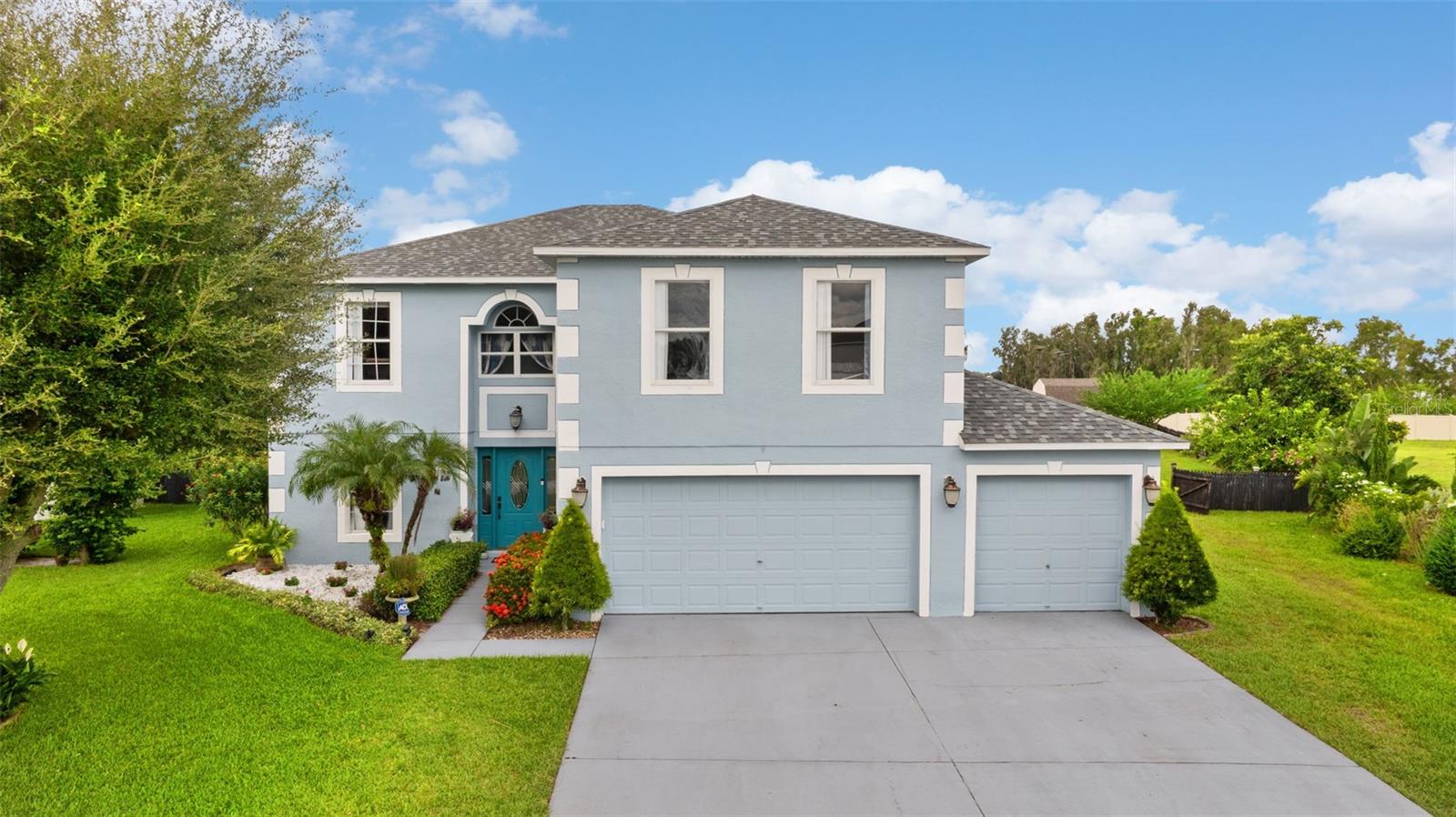 Price adjustment of only $1,000.00 after Bathrooms remodeled & Interior paint of home. This stunning two-story home offers 4 spacious bedrooms, 2.5 baths, and a total of 3,748 sq. ft. of living space on over half an acre with picturesque lake views. The thoughtfully designed layout includes a formal living room, dining room, bonus room, and an upstairs loft—perfect for flexible living or entertaining.The first floor features ceramic tile throughout, while the upstairs boasts laminate flooring, except for the plush Master Suite, which provides a serene retreat. Enjoy an updated kitchen with modern finishes, window blinds throughout, and other tasteful upgrades throughout the home.Step outside to a screened-in lanai, ideal for relaxing and enjoying the view of the lake, shade trees, fruit trees, and a shed for extra storage. A spacious 3-car garage completes the package.Conveniently located near Winter Haven, Bartow, and Highway 570, this home offers both tranquility and accessibility. Don’t miss this opportunity to own a large home with a premium lot and scenic surroundings!