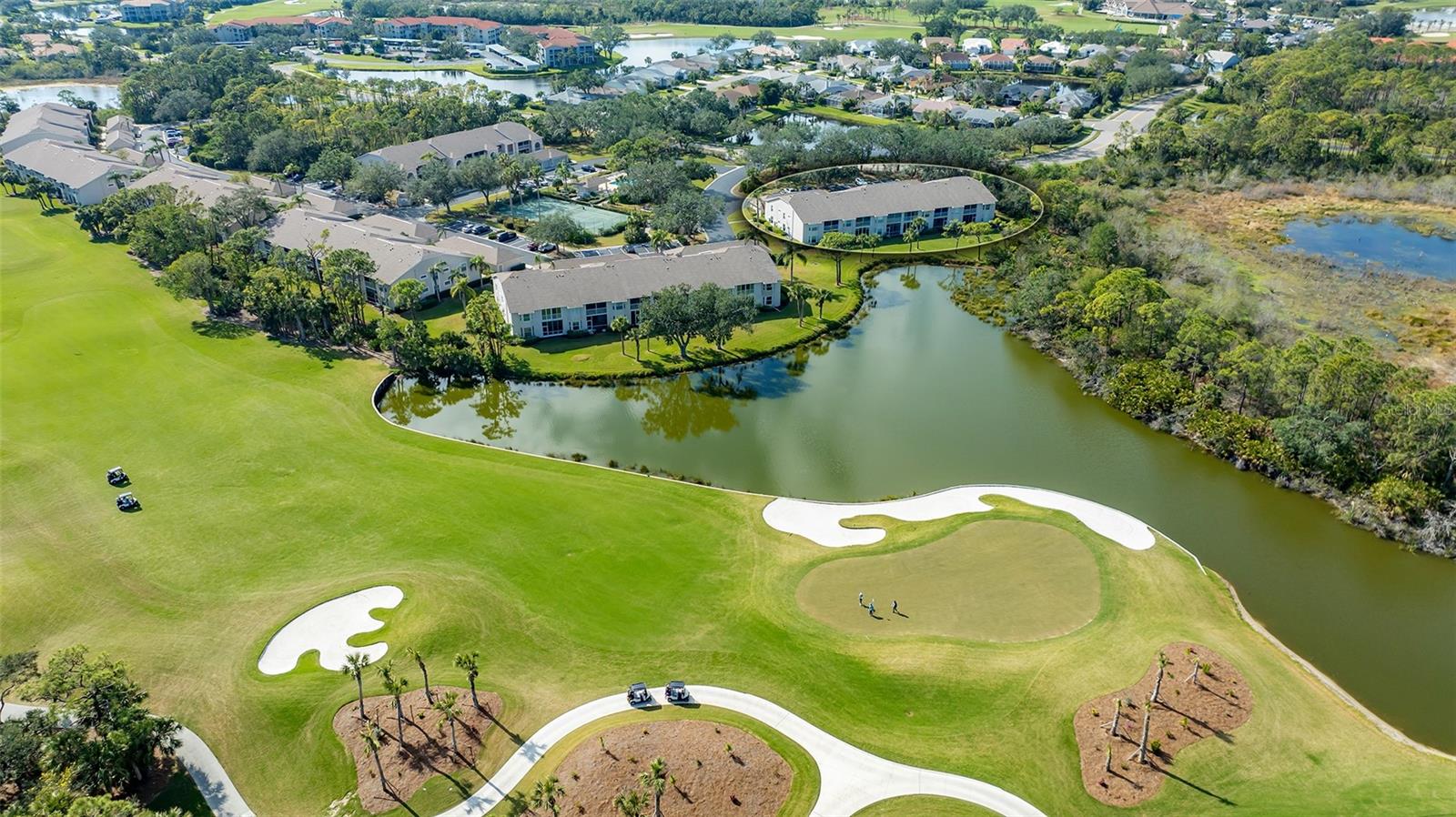 Ground Floor Turnkey Abbey unit with amazing views of the 7th Green, sand trap and lake!  Come and see to appreciate this lovely unit with an updated Kitchen with Granite Counters.  Open floor plan and a true 3 bedroom condo.  Glassed-in Lanai to expand the living space.  Primary Bedroom has twin walk in closets, twin sinks and walk-in shower along with a lovely soaking tub.  Guest quarters in the front of the home with its own walk-in closet and there is a privacy door from the 3rd bedroom towards the guest bath and laundry room.  Front entry way lanai and single car garage. Tile or Laminate throughout the home.  Lovely Community Pool and Pickleball/Tennis Court.  Short distance to the clubhouse.  Stoneybrook of Sarasota A premier member-owned country club, is only a short distance from Siesta Key and offers easy access to shopping and borders the Legacy Trail. Ownership in Stoneybrook Golf and Country Club includes a completely updated 18 hole golf course in 2024, clubhouse and restaurant, Har-Tru tennis facility, well-equipped fitness center and additional club pool and spa.  Nestled between Downtown Sarasota and Downtown Venice.