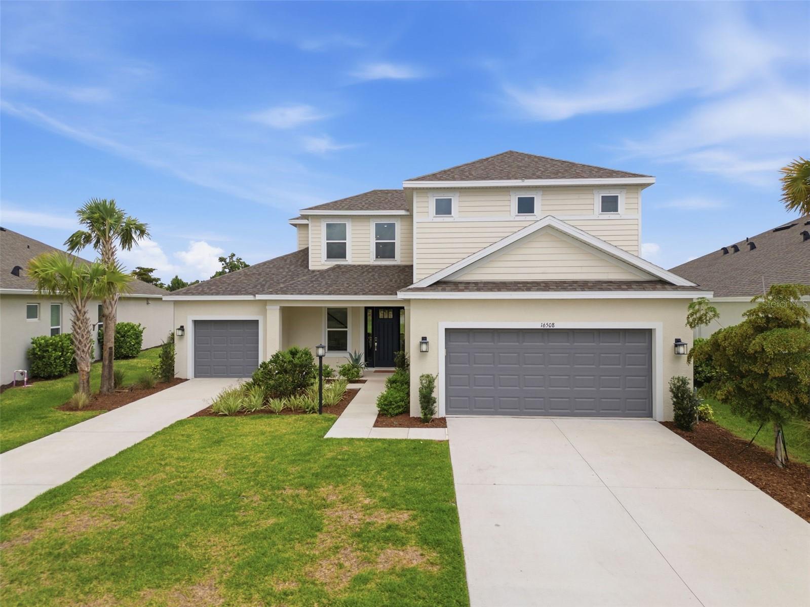 Welcome to this exceptional Taylor Morrison Tortola model located in the desirable Park East at Azario community in Lakewood Ranch. This impressive two-story residence offers 5 bedrooms, 4.5 bathrooms, 3,428 square feet of thoughtfully designed living space, and 2 garages! 
Designed for both everyday living and entertaining, the open-concept floor plan features soaring ceilings, abundant natural light, and a versatile bonus room perfect for a media room, playroom, home office, or additional living space. At the heart of the home, the gourmet kitchen is a chef's dream, featuring an oversized center island, extensive counter space, abundant cabinetry, and a large walk-in pantry, all seamlessly connected to the main living and dining areas.

The spacious primary suite provides a private retreat with a luxurious ensuite bathroom and generous closet space, while four additional bedrooms offer flexibility for family and guests.

Enjoy resort-style living in Park East at Azario, where residents have access to a community pool, dog park, and playground. Conveniently located near Lakewood Ranch's top-rated schools, shopping, dining, parks, and entertainment, this home offers the perfect blend of comfort, style, and an active Florida lifestyle.

Don't miss this incredible opportunity to own a beautiful home in one of Lakewood Ranch's most sought-after communities.