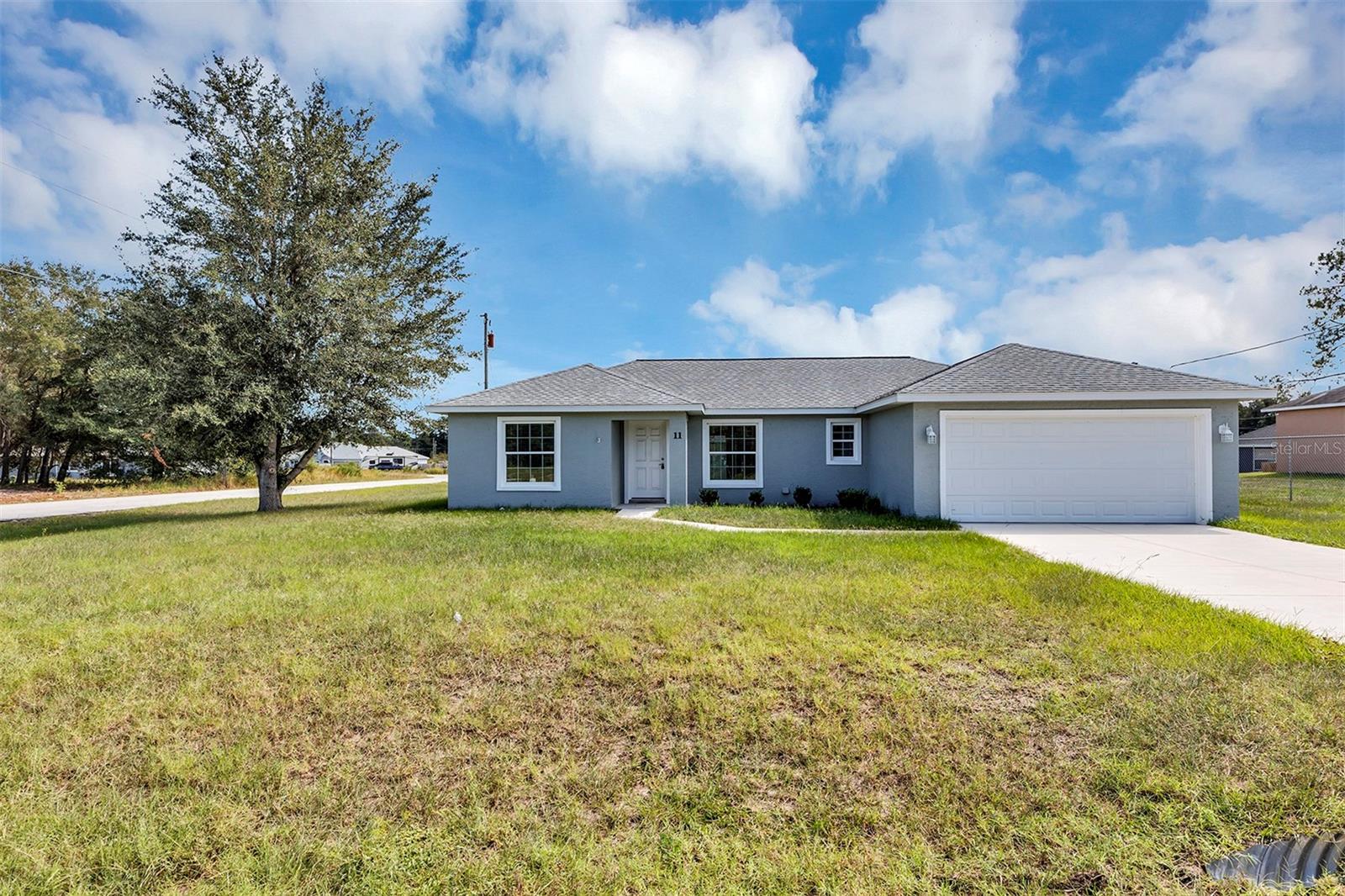 Welcome home to this beautiful corner lot property available in Silver Springs Shores!
Built in 2020, this 1394sf house is ready for it's next family to call it their own. With LVP throughout, there is NO CARPET. Solid surface counter tops in the kitchen are ready for you to host your family and friends on, while the SS appliance package, and trending shaker cabinets make the kitchen complete.  The home also features: Inside Washer/ Dryer hook ups, tiled walls in the tub/shower area, Ceiling fans in every room, and blinds on the windows.
This home is priced to sell and won't last long in Silver Springs Shores- make an offer TODAY!