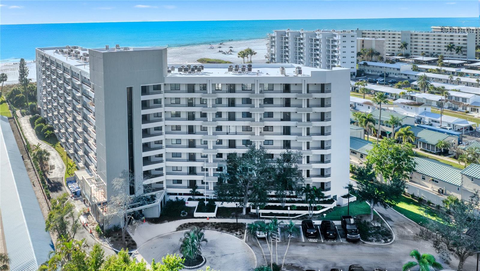 TOP FLOOR. TOP BEACH. TOP NOTCH. This Siesta Key condo checks ALL the hard to find boxes — THREE bedrooms. PRIVATE Beach. TOP Floor. RESORT Style Amenities. GARAGE Parking Space. NO Work Needed!  Welcome to Unit 907, a beautifully refreshed top-floor residence offering generous living space, a calm coastal feel, and the easy beach lifestyle buyers are looking for. From the moment you open the door, the residence feels bright, relaxed, and beautifully pulled together with updated coastal furnishings and a soft beachside palette. Spacious living and dining areas create an easy flow for everyday enjoyment or extended stays, while the kitchen offers quartz countertops, stainless appliances, breakfast bar, and generous storage. The Master Bedroom has spectacular gulf views, ensuite with double sinks, walk-in shower, and a spacious closet. The split-bedroom floor plan with two guest bedrooms provides privacy and flexibility for guests, or home office, hobbies, and additional storage. The Casarina community has recently completed significant improvements which include a new roof, elevator updates, electrical updates, new A/C units, flood-prevention panels, new carport roofs, refreshed landscaping, new driveway and pool pavers, new grilling area, and more — assessments already paid by seller! Get ready to enjoy approximately 7 acres of tropical grounds, direct access to Siesta Key's powdery-soft, white sand beach, heated pool and spa, clubhouse, fitness room, tennis and pickleball courts, basketball, BBQ areas, onsite management, secured access, two elevators, and beautifully maintained outdoor spaces. Minutes from Siesta Key Village, dining, shopping, and downtown Sarasota. Contact me today to schedule your private tour and start living the Siesta Key lifestyle you've always dreamed of.