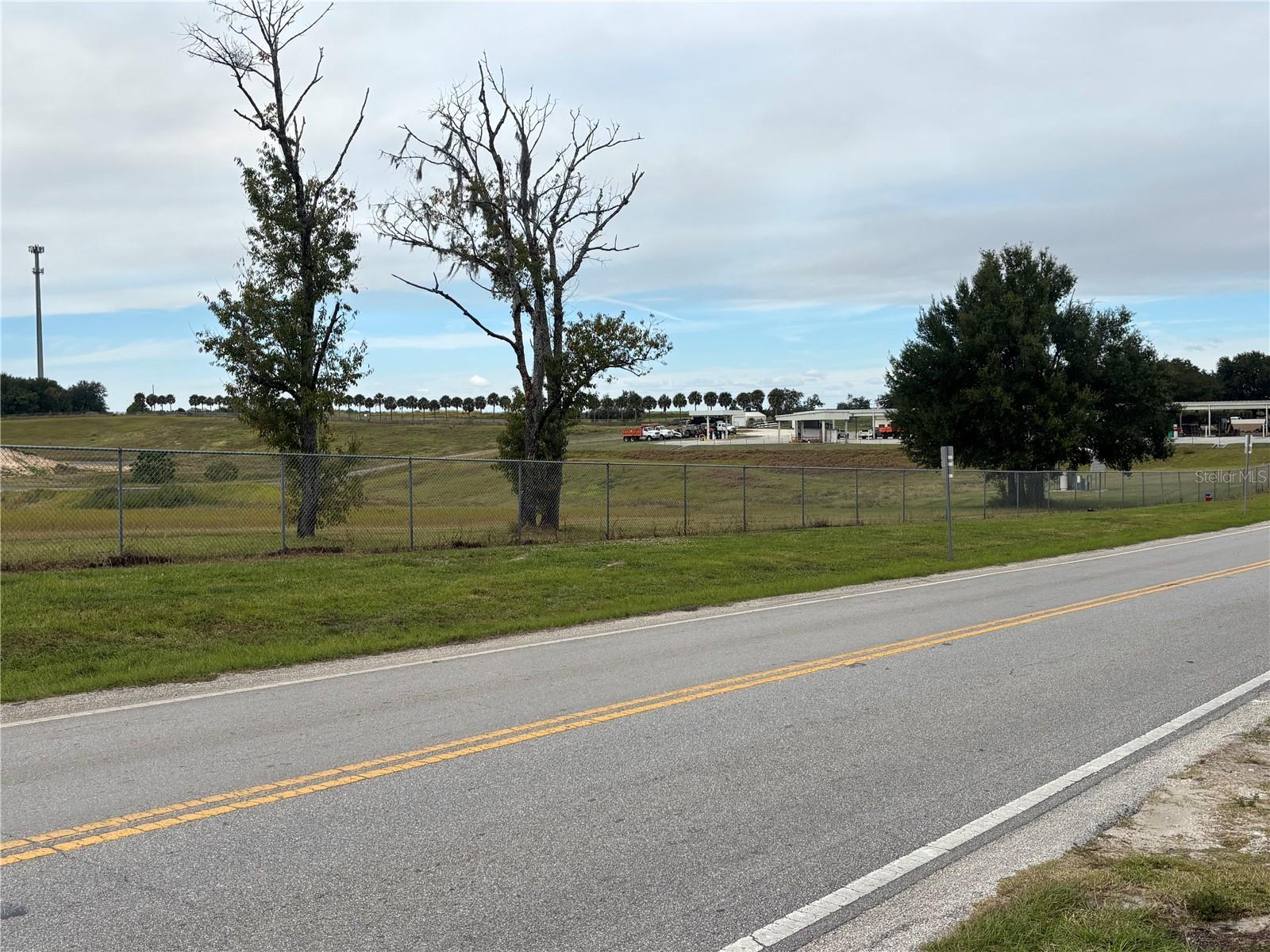 Great opportunity for redevelopment. With a proper zoning change or a PUD, these 4 adjacent Apopka, Fl properties are ideal for townhouse, multifamily or mixed-uses. Beautifully treed & high/dry acreage ready for the right concept or development. Hundreds of feet of frontage on Golden Gem Road gives these properties nice accessibility & a location convenient to the 429, new retail businesses including a new Publix & other retail/commercial outlets. With over 20 acres, 210 townhouses (or more) or 350+ apartments are a possibility. Very HIGH GROWTH area, just minutes to the new Kelly Park Rd Corridor including Wyld Oaks where plans include a mixed-use destination of over 200,000 sf of commercial retail, a health village with ER & helipad, two hotels, a live entertainment venue, signature parks, including BARK, America's Top Dog Park, and 5,000 planned residential units & town center with a new Main Street. Multiple other residential & commercial developments are underway in the area A mixed-use of commercial retail/office/medical or flex space could be in the mix for these properties. Buyer should verify end uses, zoning change requirements, utility availability, concurrencies, & any other development needs. Occupied manufactured houses on the properties are not given any value & as this is considered a vacant land offering - sold AS-IS.