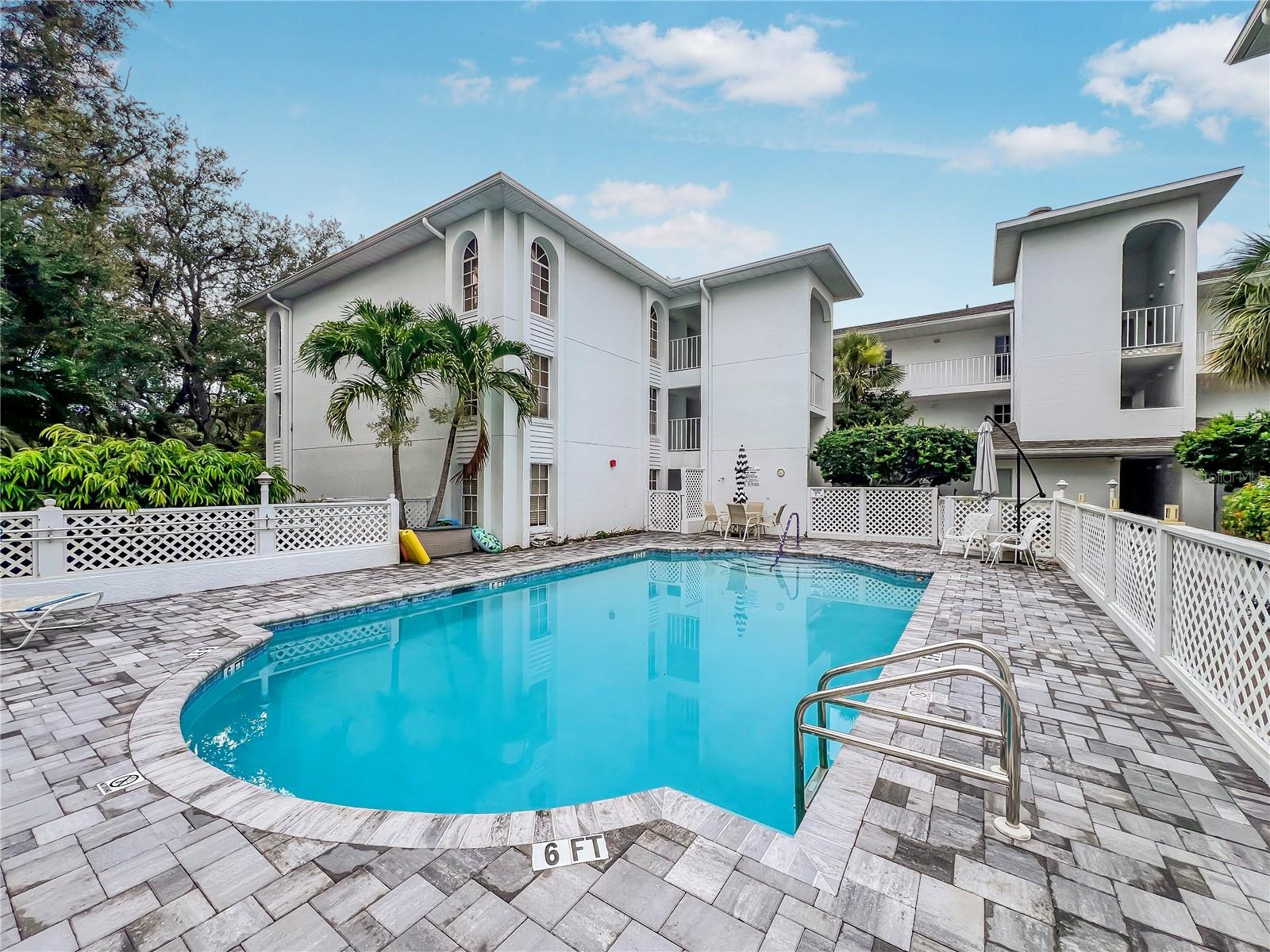 FIRST FLOOR UPDATED CONDO w/ WATER VIEWS! Welcome to Landmark At Pointe West... peaceful, quaint, and a great location. Within close proximity to Gulf Coast beaches and plenty of bang for your buck. No age restrictions and pet friendly. Only 30 units comprise this community... the amenities include a large pool, BBQ area, fire pit, beautiful nature pond, community garden, and covered parking spots. INITIAL MILESTONE SURVEY ALREADY PASSED, NO SECOND-STAGE INSPECTION NEEDED. Just bring yours bags! This condo comes equipped with a NEW A/C unit, NEW flooring, NEW cabinets, NEW kitchen countertop, NEW appliances, and FRESH paint. Offering 2 bedrooms and 2 bathrooms, with an open floor plan that compliments many lifestyles. Your kitchen has been completely updated and is ready to be put to use. An open layout gives you enough space to entertain guests and seamlessly be connected to the living area. The primary bedroom is secluded in the back of the unit with views of the adjacent pond, where you can find a stock of turtles and birds. The primary bathroom is updated and a features a huge walk-in closet. This room is also connected to the screened in porch that is great for enjoying the peaceful scenery. There is an additional storage closet on the porch. The second bedroom and bathroom are great for having guests over or providing space for a family, with a spacious room and closet. MONTHLY FEE INCLUDES: EXTERIOR INSURANCE, WATER, INTERNET, TRASH, & CABLE. A community pool is just steps away from the front door and is great for enjoying summer days in Florida. Stairs and an elevator are available for servicing. This unit also comes with an assigned, covered parking spot and the lot has ample guest/ overflow parking. Did I mention the location? So close to everything but it feels as if you're a world away. ~6 miles to AMI, ~4 miles to Robinson Preserve, ~3 miles to IMG Academy, ~1 mile to GT Bray park just to name a few of the nearby attractions. There is also a plethora of essential stores and retail nearby, hospitals, schools, churches, just about everything you could ever need... this location in West Bradenton is a hidden gem. ALSO, A STRUCTURAL INTEGRITY RESERVE STUDY COMPLETE AND IS IN COMPLIANCE WITH CURRENT REQUIREMENTS. Take advantage of this opportunity today and come see for yourself!