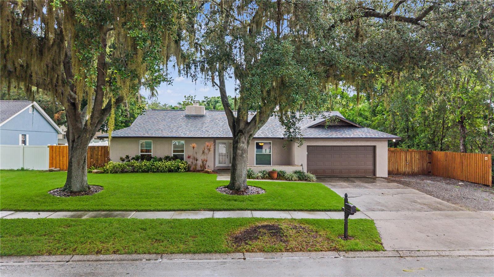 Welcome Home to this beautifully maintained residence offering the perfect blend of comfort style and functionality.  No CDD No HOA.  Showcasing a new roof (2024), all new windows, window treatments and newly insulated attic.  Featuring just remodeled spacious living areas.  This inviting home boasts an open concept floor plan ideal for both everyday living and entertaining.  The well-appointed kitchen offers ample cabinetry, generous counter pace and modern appliances, flowing seamlessly into the living and dining area.  Step outside to enjoy a beautifully landscaped backyard perfect for relaxing, gardening or hosting gatherings.  Additional highlights include a large screened Lani and a separate shed for storage.  This home is located in a convenient location, close to shopping, dining, parks and schools. Whether you are searching for your first home, your forever home or an excellent investment opportunity, this exceptional property is ready to welcome its next owner.  Schedule your private showing today!