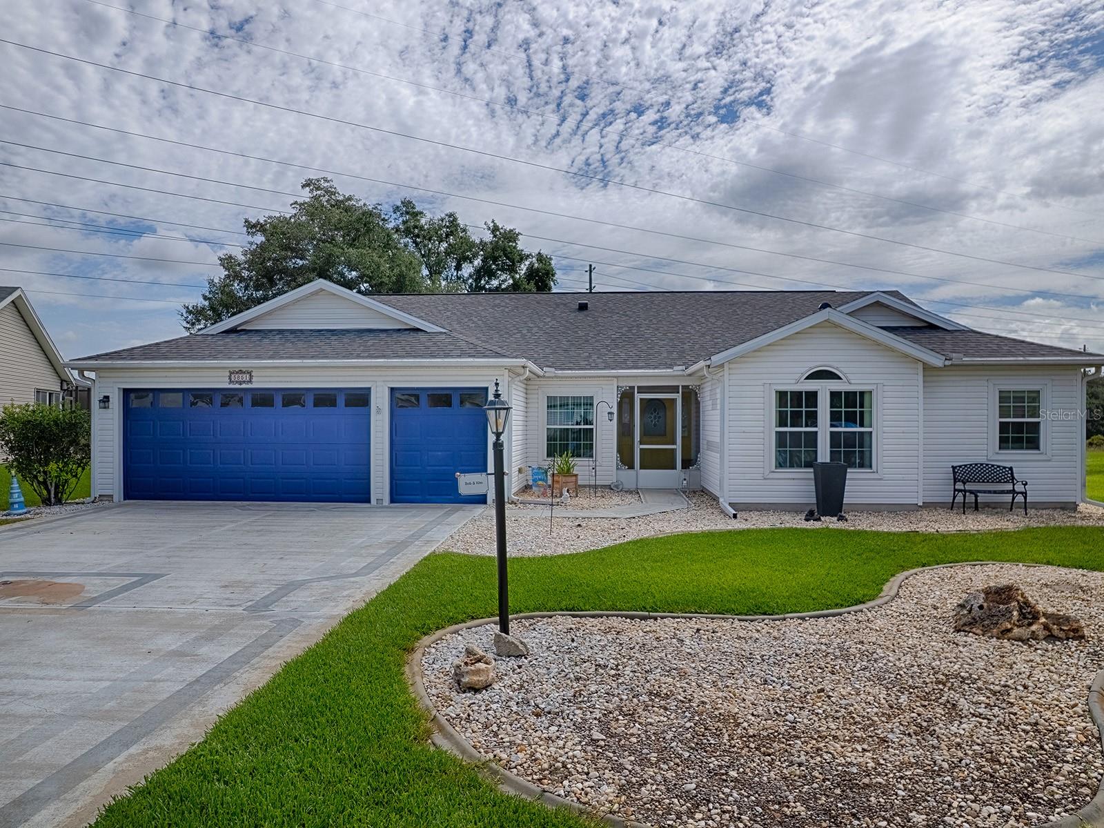 Expanded Rose Model! This spacious home features 2 owner's suites with large walk-in closets and an abundance of living space, including a family room, formal living room, dining room, den, and great room. The kitchen offers a large breakfast bar with seating and plenty of workspace. Major updates include Lifetime Anderson windows, a new roof, and a new A/C.

Enjoy the privacy of the screened lanai overlooking green space, plus a large patio perfect for grilling and entertaining. The oversized 2-car garage includes a separate golf cart garage, and the extended driveway provides ample parking. Beautiful mature landscaping adds to the home's curb appeal.

Located in the highly desirable Plantation at Leesburg, this premier 55+ gated community offers outstanding amenities, including 2 championship golf courses, 3 clubhouses, 3 swimming pools, 2 fitness centers, pickleball, tennis, walking trails, softball, basketball, billiards, a woodworking shop, horseshoes, a pro shop, and countless clubs and activities. Residents also enjoy the community restaurant and lounge featuring live entertainment, drink specials, and weekend bands.

Low HOA fees, resort-style living, and a quick closing available make this home an exceptional value. Schedule your private showing today!