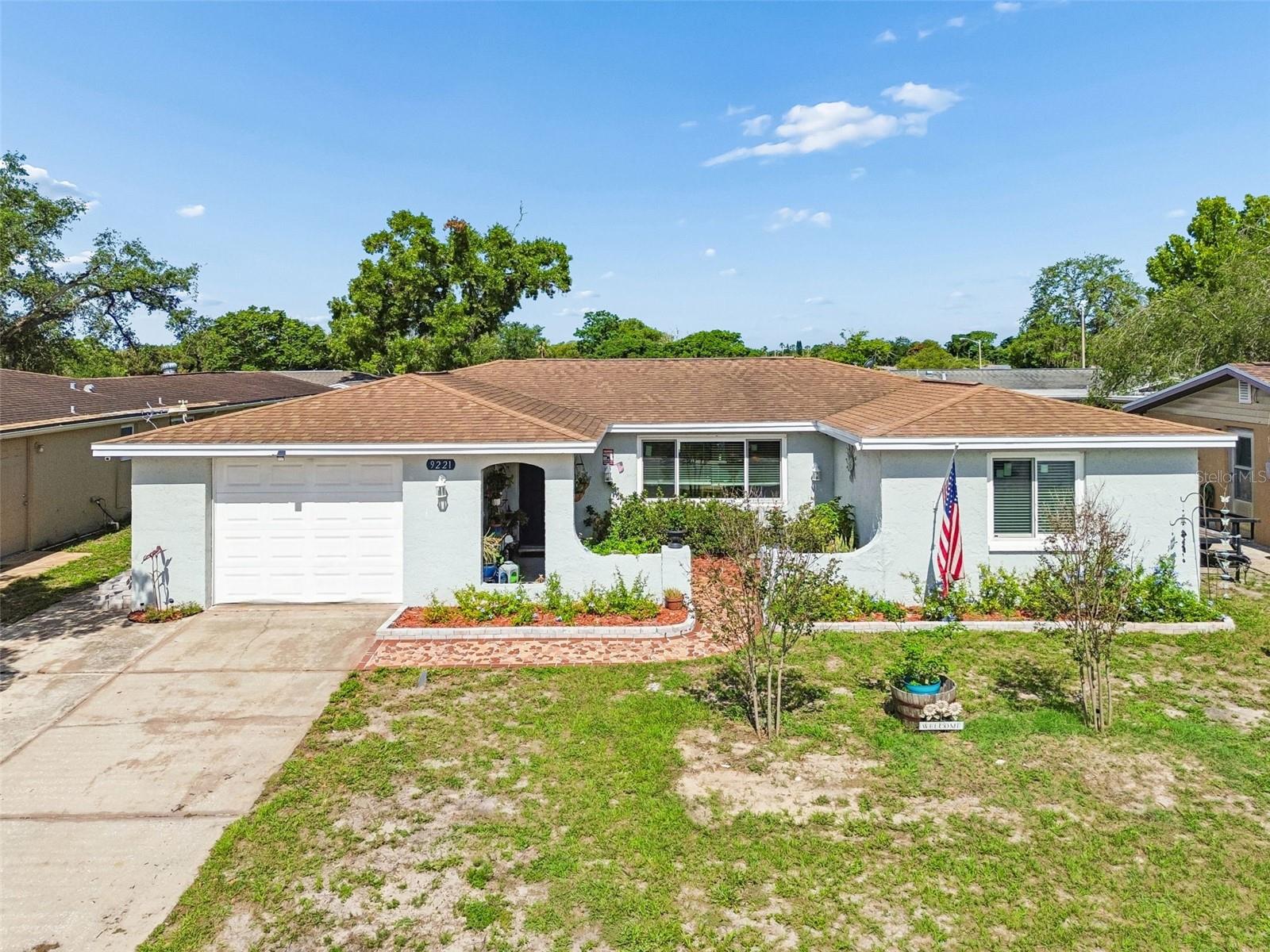 This charming single-level bungalow offers a wonderful blend of character and modern convenience. The exterior features a welcoming front facade with a tile walkway and a private backyard with a privacy fence and an outdoor shed for additional storage.
Inside, the home boasts a formal living room and dining room, complemented by tile and hardwood flooring throughout. The kitchen is designed for functionality with bar top seating, while the sun-filled Florida room and exterior patio provide excellent spaces for relaxing or entertaining guests. HWH-2019; HVAC-2012; ROOF- 2011