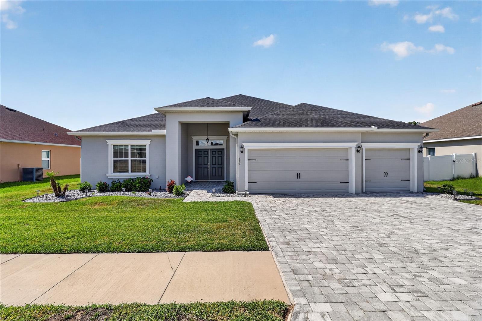 Welcome to a home where everyday living feels like a retreat. Nestled in the highly desirable community of Juliana Village in Auburndale, this exceptional move-in ready residence offers the perfect balance of luxury, comfort, and peaceful Florida living. Backing up to a beautiful conservation area, you'll enjoy privacy, tranquility, and breathtaking views right from your own backyard.
Imagine starting your mornings with a cup of coffee on the screened lanai while listening to nature, spending weekends hosting family and friends in the spacious open living areas, and ending your evenings relaxing in your private owner's suite after a long day. Every space in this home was designed to bring people together while still providing plenty of room for everyone to enjoy their own privacy.
With over 3,000 square feet of thoughtfully designed living space, this home offers five spacious bedrooms, 3.5 bathrooms, and a versatile upstairs loft complete with its own half bath and separate AC system. Whether you dream of a home theater, fitness room, game room, home office, or guest retreat, this flexible space easily adapts to your lifestyle.
The heart of the home is the beautifully designed gourmet kitchen featuring 42-inch cabinetry with crown molding, granite countertops, stainless steel appliances, a large pantry, and an oversized island that naturally becomes the gathering place for holidays, celebrations, and everyday conversations.
The luxurious owner's suite is your own private escape, featuring a spacious walk-in closet, dual vanities, a beautifully tiled shower, and a relaxing garden tub perfect for unwinding at the end of the day.
Step outside to enjoy true Florida outdoor living. The covered and screened lanai overlooks a fully fenced backyard with peaceful conservation views, creating the perfect setting for weekend barbecues, family gatherings, pets to play, or simply enjoying the quiet beauty that surrounds you.
Additional upgrades include a three-car garage, radiant barrier attic insulation for energy efficiency, gutters, a paved driveway, beautiful landscaping, ceramic tile flooring throughout the main living areas, custom blinds, and elegant finishes that make this home as practical as it is beautiful.
Located just minutes from I-4, you'll enjoy quick access to Orlando, Lakeland, shopping, dining, medical facilities, golf courses, and world-famous attractions, all while coming home to the charm and peaceful atmosphere of Auburndale.
This is more than a house, it's a place to create memories, celebrate milestones, entertain loved ones, and enjoy the lifestyle you've worked so hard to achieve. Welcome home.