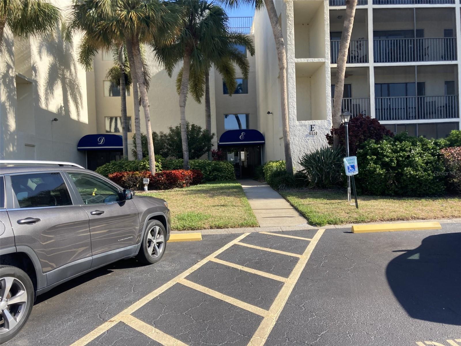 Exceptionally nice remodeled turnkey furnished first floor two bedroom-two bath condo. There is luxury woodgrain vinyl flooring throughout except for both bathrooms and the lanai which has ceramic tile. The kitchen ceiling has been recessed, cabinets are light in color and there are solid surface countertops and stainless steel appliances. The master bath has a new modern tub and attractive tile surround with glass enclosure - new vanity, mirror and lighting.  Second bathroom has beautiful walk-in shower with all new tile and glass doors.  The walls are also tiled and there is a new vanity, light and mirror plus toilet.  The entry sliding closet doors and master bedroom closet door are modern with frosted glass.  The dining area and living room are very spacious with a bedroom and bath on each side.  The living room and bedrooms all have sliding glass doors which open to the large screen lanai.  This condo has plenty of storage space - large front entry closet, walk-in pantry, walk-in closet in second bedroom, large closet in master plus linen closet and a large storage closet on lanai.  There are coin operated washers and dryers at the end of the hallway.  The community has a heated pool plus a clubhouse.  This property is located in the IMG Country Club area, which features an 18 hole regulation golf course and clubhouse located on Sarasota Bay - open to the public.  Nearby is also a tennis club.  There are groceries, restaurants and shopping nearby plus it is about 8 miles to the beach, also close proximity to Sarasota.