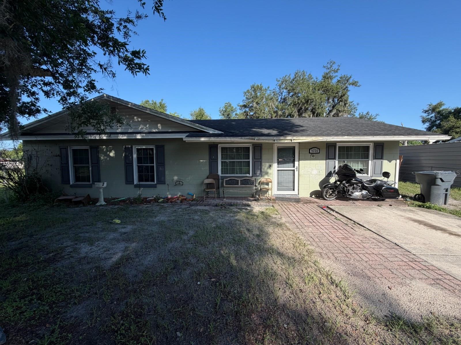 No HOA & 100% Financing Available! Bring your boats, campers, and work trucks—this spacious 0.31-acre property has room for it all. Inside, enjoy a functional layout featuring a formal living room with classic crown molding, a separate dining area, an inside utility room, and ample storage. Both the kitchen and bathroom have been beautifully remodeled. Unwind on the screened lanai overlooking a massive, partially fenced backyard that is perfect for a playground, pets, or outdoor toys. Take advantage of USDA 100% financing eligibility and make this versatile home yours today!