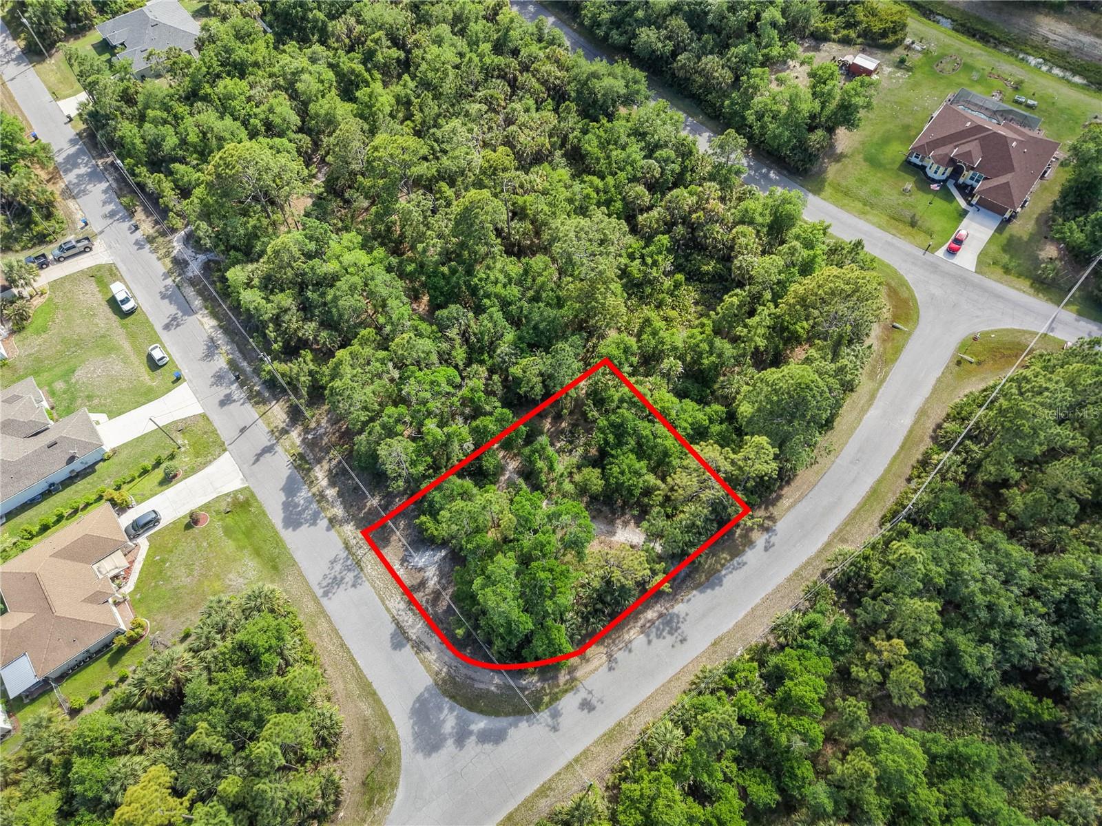 Discover this beautiful corner lot in North Port, nestled in Florida’s natural landscape. Conveniently located near Myakkahatchee Creek Environmental Park, Wellen Park, Warm Mineral Springs and the Gulf beaches, with easy access to I-75 and nearby shopping, dining and recreational amenities. Positioned in a rapidly growing area, the property is close to Costco, Wellen Park, the State College of Florida and approximately 3 miles from the new Sarasota Memorial Hospital campus currently under construction, adding strong future value and demand to the location. Whether you’re looking for a smart investment or the perfect place to build your dream home, this lot offers outstanding potential in one of Southwest Florida’s most up-and-coming communities.