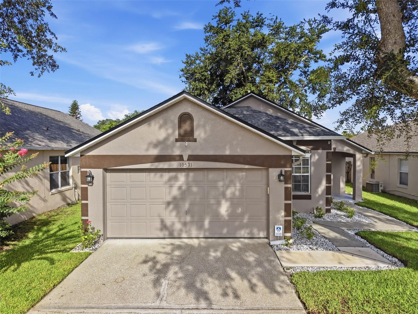 Looking for a move-in ready home in Orlando with all the major updates already completed? Welcome to this immaculately maintained 3-bedroom, 2-bath, one-story home offering 1,286 square feet of living space (1,746 total square feet). From the moment you arrive, you'll appreciate the pride of ownership and exceptional care this home has received.

Inside, you'll find a bright, open floor plan featuring fresh interior paint, spacious living areas, and a beautifully updated kitchen with premium Silestone® quartz countertops. The home is designed for comfortable everyday living while offering low-maintenance features today's buyers are searching for.

One of the highlights of the home is the expansive screened-in back patio, providing the perfect space to enjoy your morning coffee, entertain guests, or relax outdoors year-round in comfort.

Major improvements provide peace of mind, including a NEW ROOF (2023), NEW HVAC SYSTEM (2023), RE-PIPED PLUMBING (2025), NEW WATER HEATER (2020), fresh interior and exterior paint, and numerous updates throughout. The garage has also been upgraded with durable interlocking modular flooring, creating a clean, finished space that's perfect for parking, hobbies, a home gym, or additional storage.

HOA has low fees and includes a community pool too!!

Conveniently located near shopping, restaurants, major highways, parks, and employers, this home offers the perfect combination of location, comfort, and value. If you've been searching for a turnkey, move-in ready, single-story home with major system updates, premium quartz countertops, a screened lanai, and low-maintenance living, this home checks all the boxes. Schedule your private showing today!