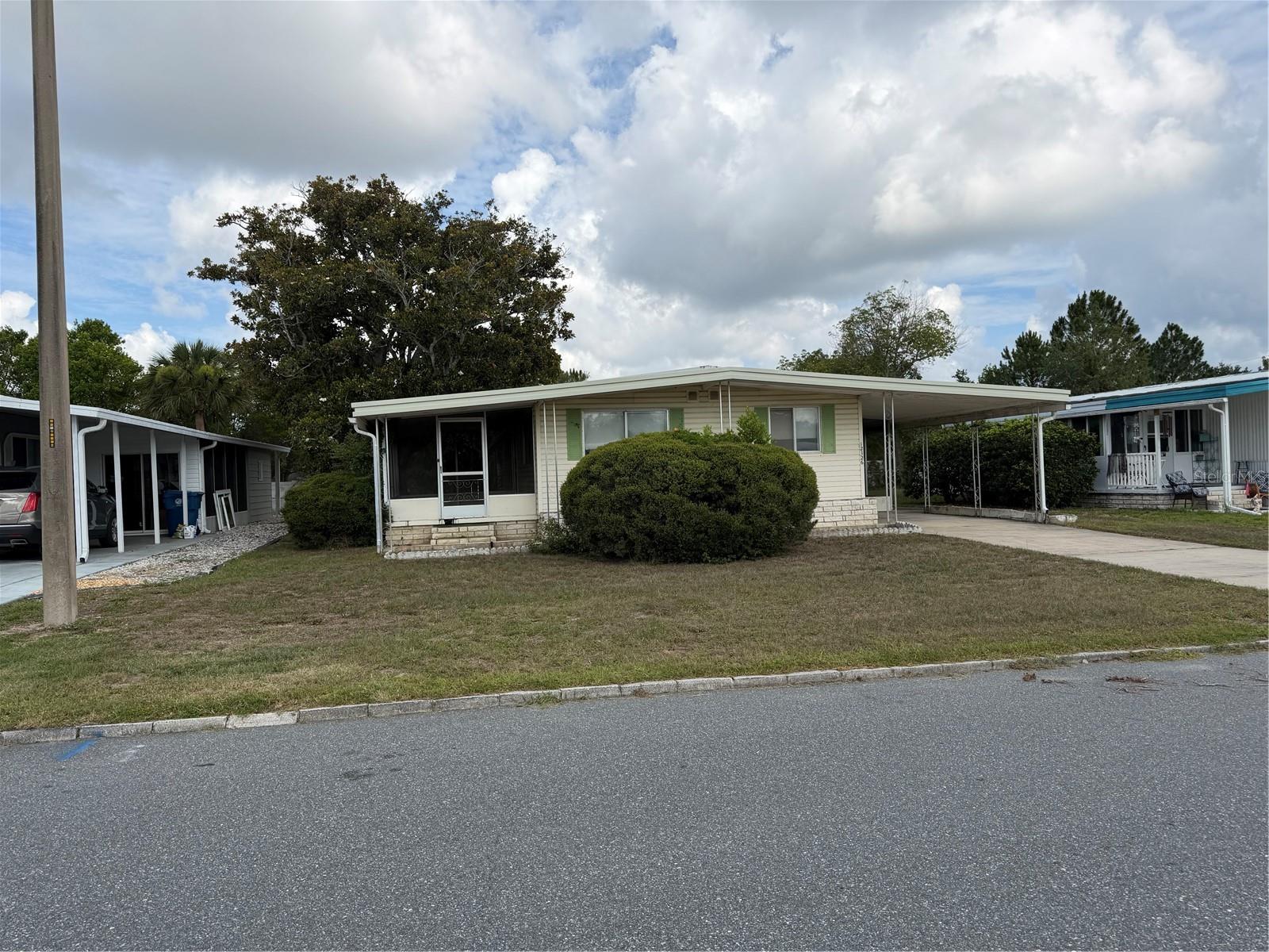 Investor Special in High Point! Opportunity awaits with this 2-bedroom, 2-bath home located in the desirable High Point 55+ golf community where you own your land. This property is being sold AS-IS and is ready for your vision and updates. No appliances are included. Whether you're looking for your next renovation project, investment property, or affordable retirement retreat, this home offers great potential at an attractive price. Enjoy all that High Point has to offer, including golf, clubhouse activities, community amenities, and a convenient location close to shopping, dining, medical facilities, and the Suncoast Parkway. Bring your ideas and make this one your own!