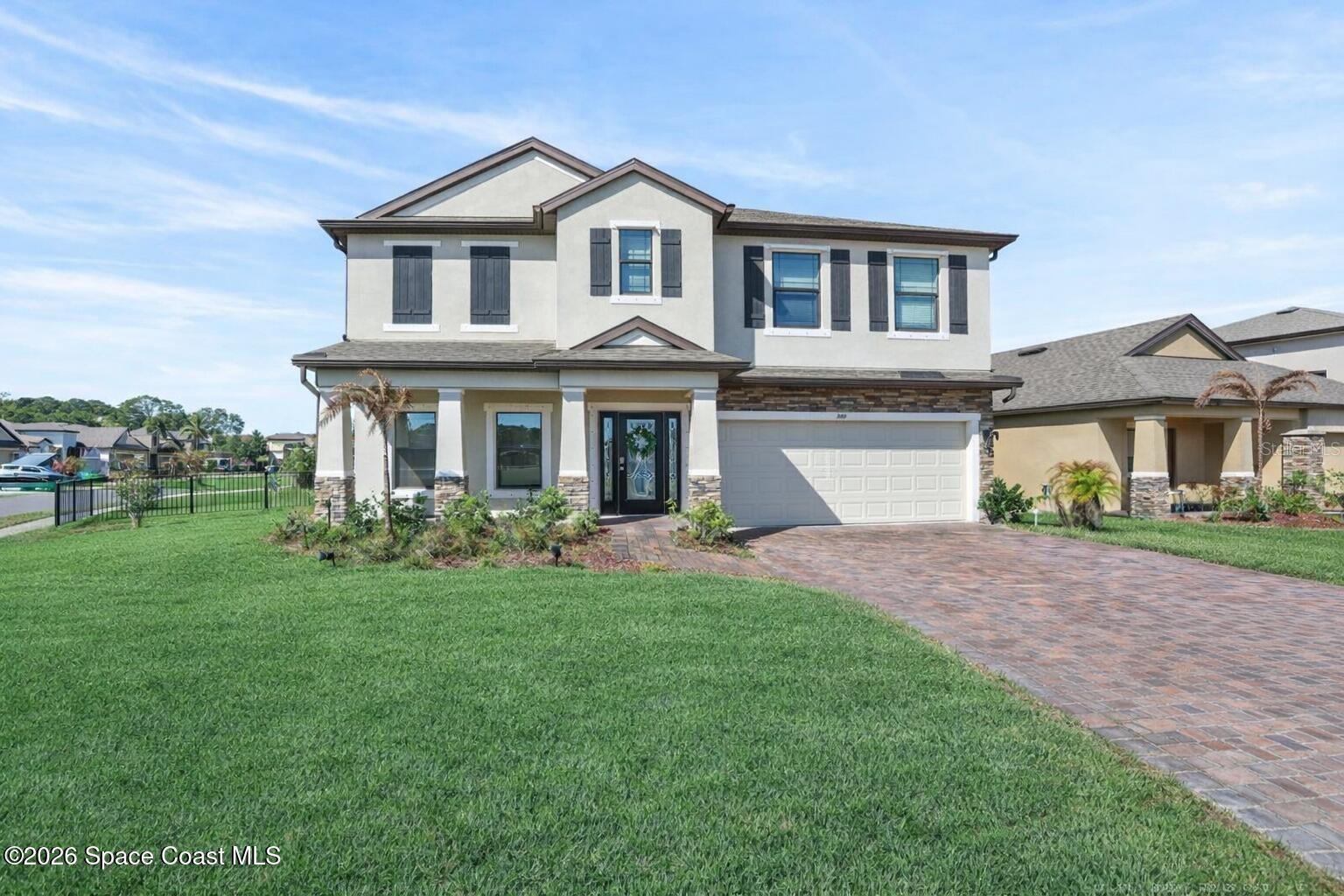 Welcome to resort-style living in the highly desirable Sawgrass Lakes community! This spacious two-story CBS home sits on a premium corner lot with beautiful water views, offering both privacy and scenic surroundings in one of the area's most sought-after gated neighborhoods. Inside, you'll find a versatile and functional floor plan designed for comfortable everyday living and entertaining. The home features two separate living spaces--one downstairs and another upstairs--providing plenty of room for different options. The open layout allows natural light to flow throughout the home, while the generous living areas make it easy to host family and friends. The corner lot position enhances the sense of space and showcases peaceful water views that add to the home's charm. Residents of Sawgrass Lakes enjoy exceptional amenities including a resort-style pool, clubhouse, and gated entry, creating a true community atmosphere. Conveniently located near shopping, dining, parks, and I-95.