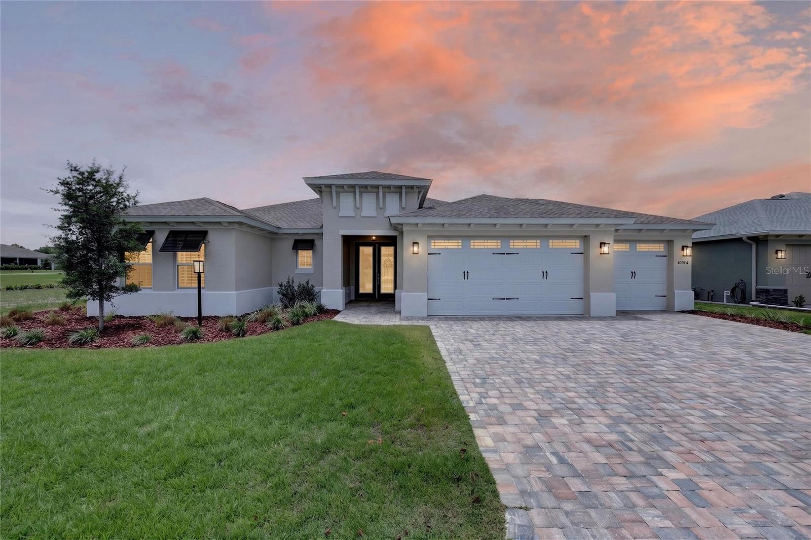 THIS POPULAR WELLINGTON MODEL CAN BE YOURS. IT'S READY! LOCATED CLOSE TO THE NEW SUMMIT CLUBHOUSE WITH ALL OF IT'S BEAUTIFUL AMMENITIES. THIS BRIGHT AND BEAUTIFUL GREAT ROOM OVERLOOKS A LARGE, PRIVATE RETENTION AREA THAT IS PERFECT FOR VIEWING NATURE'S BEAUTY. THE GRAND MASTER ON ONE SIDE WILL GIVE YOU PRIVACY AS WELL AS FUNCTUALITY. IT OFFERS AN OVERSIZED WALKIN CLOSET THAT LEADS DIRECTLY TO THE LAUNDRY ROOM. THE OTHER SIDE ALLOWS PRIVACY FOR A GUEST AND THE THIRD AREA HAS A FULL BEDROOM AND BATH AS WELL AS A FLEX ROOM FOR AN OFFICE OR MEDIA ROOM. THE THREE CAR GARAGE IS LOCATED ALL ON ONE SIDE AND IS ENETERED FROM THE BACK HALLWAY, WHERE THERE IS A HALF BATH CONVIENIENTLY LOCATED. YOU WILL LOVE THE LARGE PANTRY LOCATED THERE AS WELL.