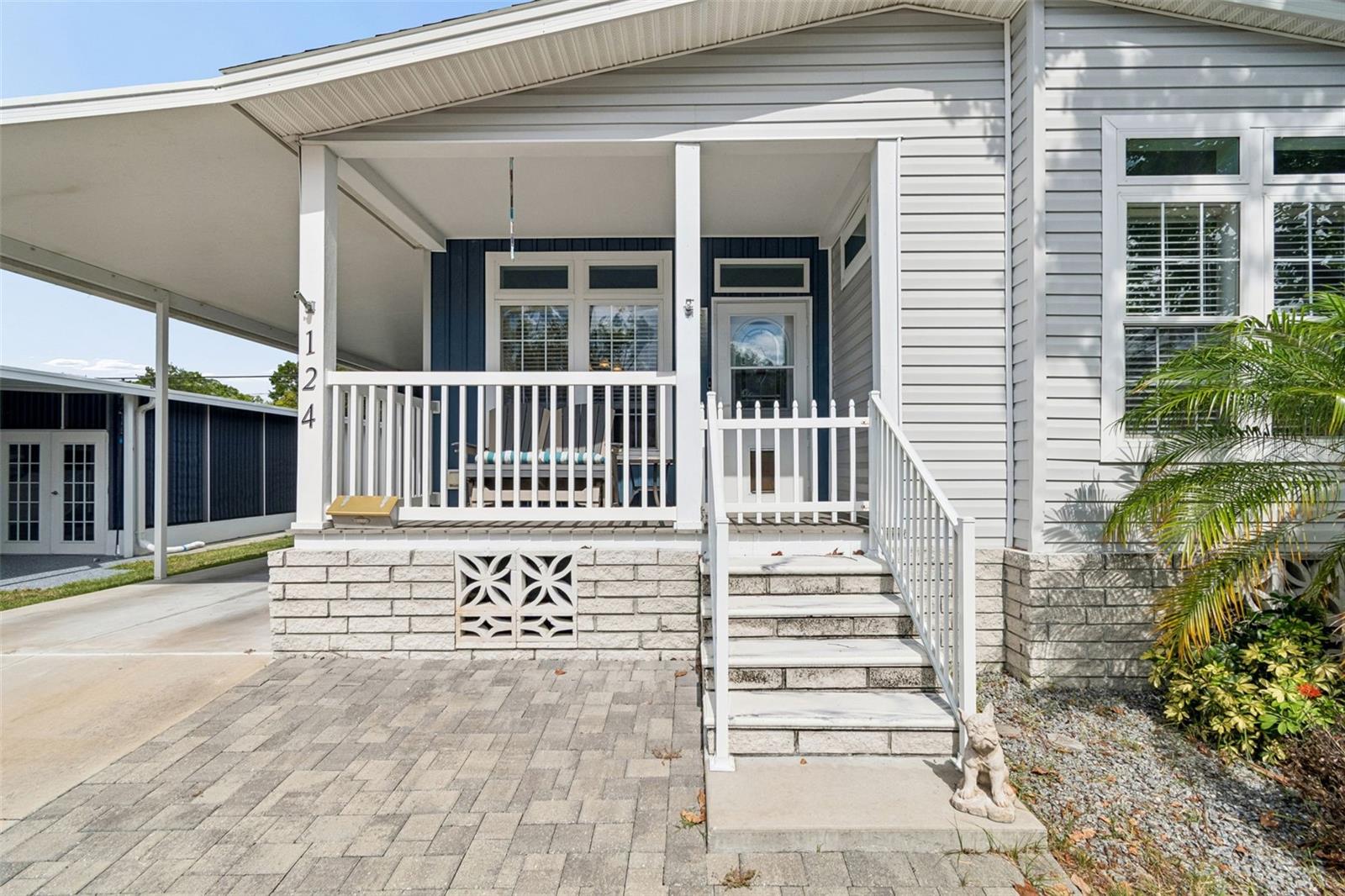 THIS IS THE ONE!!!  WELCOME HOME to this 2019 JACOBSEN IMPERIAL Model Double-wide Manufactured home.  Experience the perfect combination of quality craftsmanship, modern design, and resort-style living in this beautiful home located in the pet-friendly area of the highly sought-after Palm Hill Country Club. Offering over 1,500 square feet of thoughtfully designed living space, this 3-bedroom, 2-bathroom home showcases the superior construction and attention to detail that Jacobsen Homes are known for. Relax on the inviting covered front porch before stepping inside to discover a warm and inviting space with elegant crown molding, finished drywall throughout, custom window blinds, and an open-concept floor plan filled with natural light. Beautiful luxury plank vinyl flooring flows throughout the main living areas, while both bathrooms feature stylish plank tile flooring for a clean, contemporary finish.

Designed with entertaining in mind, the spacious living, dining, and kitchen areas flow seamlessly together, creating the perfect gathering space for family and friends. So many options to enjoy this home inside or out. Weather it's on the covered Front Porch, private backyard, or the double carport to entertain friends and family.

 The chef-inspired kitchen is the centerpiece of the home, featuring a large island with additional seating, a double stainless farmhouse sink, stainless steel appliances, a built-in microwave, stainless range hood, dishwasher, abundant cabinetry, and generous counter space for meal preparation.

The private primary suite is a relaxing retreat with a luxurious en suite bathroom featuring an oversized walk-in shower with a built-in bench. The guest bathroom also offers a walk-in shower, while both bathrooms include convenient built-in storage cabinets. An inside laundry room adds everyday convenience and functionality.  The Two additional bedrooms provide a great space for guest, home office, or Den if needed.

Additional highlights include energy-efficient solar-tinted, hurricane-rated windows, durable vinyl siding, hurricane tie-downs for added peace of mind, and a huge storage shed that provides ample room for tools, hobbies, and seasonal storage. Built with the exceptional craftsmanship and quality construction Jacobsen Homes is known for, this home offers lasting value and confidence for years to come.

Located in the desirable, golf cart-friendly, age-qualified community of Palm Hill Country Club, you'll enjoy a carefree lifestyle with a $595 monthly maintenance fee that includes water, sewer, trash removal, lawn care, cable television, internet, and access to an impressive collection of resort-style amenities.

Residents enjoy three heated resort-style pools, a relaxing spa, 2 beautiful clubhouses, a 9-hole golf course, tennis courts, pickleball, shuffleboard, horseshoes, a billiards room, and a vibrant calendar of social clubs and activities. Best of all, you're just a short drive from the beautiful Gulf beaches, shopping, dining, and everything the Florida lifestyle has waiting for YOU!