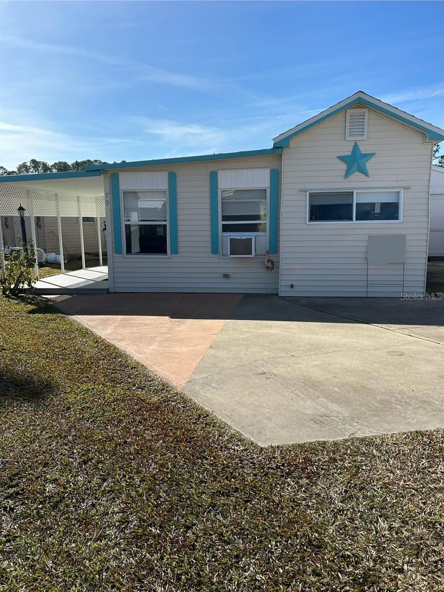 Welcome to Kove Estates a 55+ gated community located between Orlando and New Smyrna Beach. This home has 2 bedrooms and one bathroom. It is located on Little Lake for beautiful sunsets and serenity. The home has been beautifully renovated with new LVP flooring, decking, new roof and paint are a few of the improvements. The lot assessments are very low at $228 a month. Included in your assessments are trash, sewer and water. Kove Estates boasts 2 pools (one heated), 2 club houses, pickleball courts and free golf on the community's golf course.