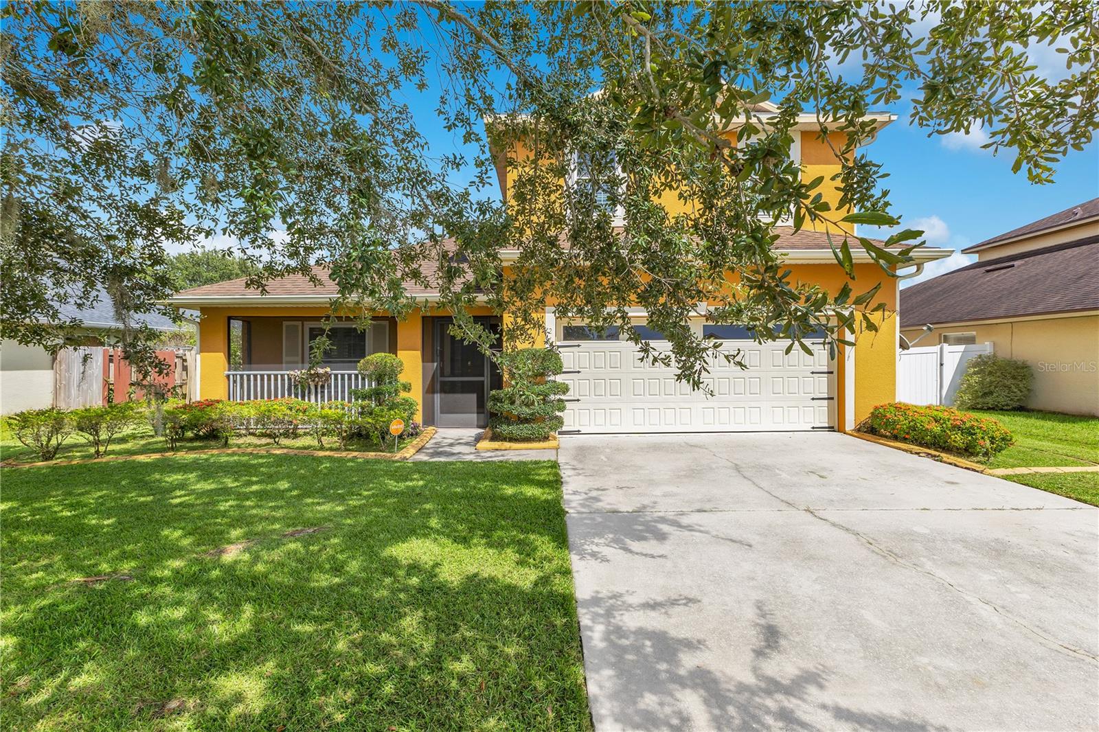 Welcome to this beautiful four bedroom 2 1/2 bath home in the desirable Eagle Lake community of Kissimmee. Featuring 2383 ft.² of living space. This spacious residence offers an open floor plan with high ceilings, a Formal Living/Dining area, and a large Family Room perfect for entertaining. The Updated Kitchen includes quartz countertops, modern stainless steel appliances, ample cabinetry, and a breakfast bar that flows seamlessly into the Informal Dining and Living area. Other updates include: *Roof, *Storm Windows, *Garage Door, *Front Door, *Stairs, *Railings and *First Floor Half Bath. All updated within the past five years. The Primary Sweet boasts a generous Walk-In Closet, In Suite Bath with Dual Sinks, Soaking Tub, and Separate Shower. Additional bedrooms are well sized and versatile for family, guest or a home office. Enjoy Florida living in your private 40‘ x 15‘ permitted, screened in back patio overlooking the pond with plenty of room for outdoor dining and relaxation including an Eight Person Above Ground Hot Hub.  Community amenities include pools, playgrounds, and walking trails, all within minutes of shopping, Dining and major highways. Just a short drive to Disney and Central Florida attractions. This home is ideal for year round living or as a vacation retreat. Don’t miss this opportunity to own a move-in ready home in a prime location.