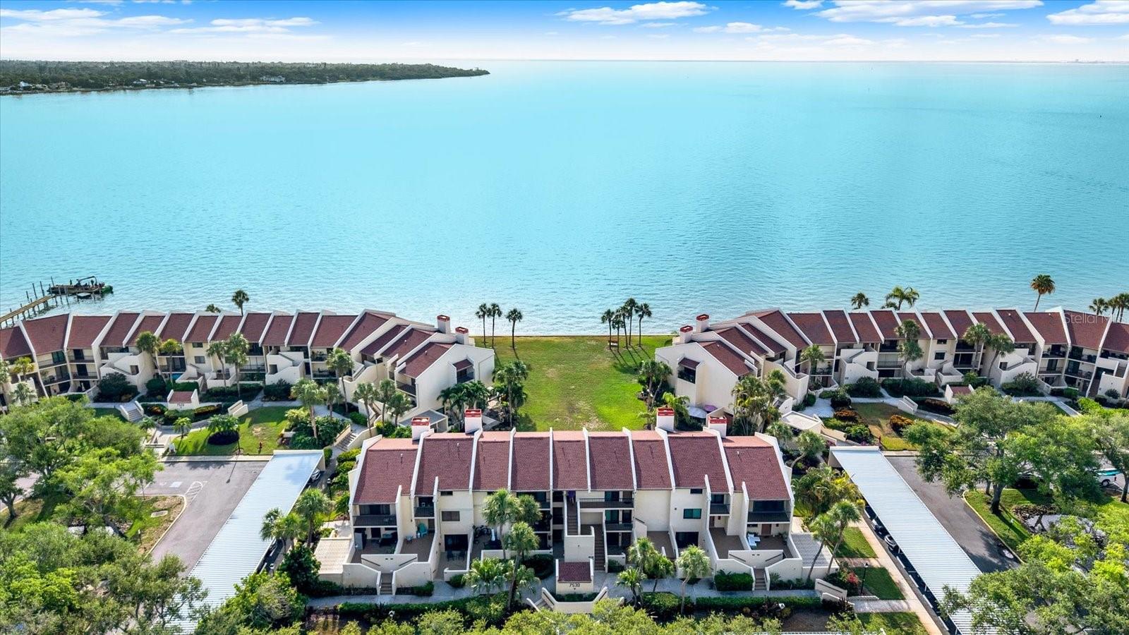 Fully Renovated Waterfront Condo with Tampa Bay Views | Offered Turnkey Furnished. Wake up to breathtaking views of Tampa Bay from this beautifully renovated waterfront condominium at 7530 Sunshine Skyway Ln S #P7. Offering 2 bedrooms, 2 bathrooms, and 1,315 square feet of thoughtfully designed living space, this exceptional residence combines luxury finishes, modern upgrades, and the relaxed coastal lifestyle that makes St. Petersburg one of Florida's most desirable waterfront destinations. Being offered turnkey furnished, this is a rare opportunity to move right in and start enjoying the Florida lifestyle from day one. Completely renovated from top to bottom, this move-in-ready condo showcases an open, light-filled floor plan designed to maximize its stunning waterfront setting. The designer kitchen features quartz countertops, custom cabinetry, stainless steel appliances, and an elegant marble backsplash, creating a sophisticated space for entertaining and everyday living. The luxurious bathrooms have been fully reimagined with exquisite tile work, premium fixtures, custom vanities, and a spa-inspired walk-in shower. Throughout the home, you'll find luxury tile flooring, custom-built closet systems with exceptional storage, a beautifully redesigned wood-burning fireplace, and hurricane-rated sliding glass doors that frame spectacular water views while providing peace of mind. Step outside to multiple private patios overlooking Tampa Bay, where you can enjoy spectacular sunrises, coastal breezes, and waterfront living at its finest. Every detail has been thoughtfully updated, including updated windows and exterior doors (2018), Key West-style shutters, an updated HVAC system (2018), newer water heater, brand-new washer and dryer, newer roof, freshly painted exterior, new landscaping, and an updated seawall surrounding the community. Additional conveniences include a covered parking space (D-1), ample guest parking, and a prime location just minutes from award-winning Gulf beaches, vibrant downtown St. Petersburg, shopping, dining, marinas, golf courses, and easy interstate access to Tampa and beyond. Whether you're seeking a full-time waterfront residence, seasonal retreat, or turnkey Florida getaway, this impeccably renovated condo delivers luxury, comfort, and unmatched Tampa Bay views in one extraordinary package. Property Highlights: Turnkey furnished and move-in ready, Waterfront condo with panoramic Tampa Bay views, 2 Bedrooms | 2 Bathrooms | 1,315 SF, Multiple private waterfront patios, Fully renovated interior, Quartz countertops and updated cabinetry, Stainless steel appliances, Marble backsplash, Spa-inspired bathrooms with designer finishes, Walk-in shower, Custom closet systems throughout, Luxury tile flooring, Renovated wood-burning fireplace, Hurricane-rated sliding glass doors, Updated windows and exterior doors (2018), Key West-style shutters, HVAC updated (2018), Newer water heater, Brand-new washer and dryer, Newer roof, Fresh exterior paint and landscaping, Updated seawall, Covered parking space, Ample guest parking,Close to St. Pete Beach, Fort De Soto, downtown St. Petersburg, shopping, dining, marinas, and major highways!