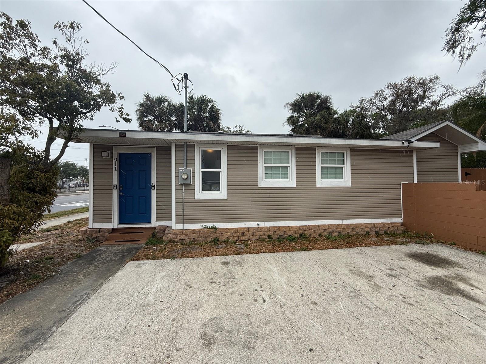 Exceptional Investment Opportunity! Two homes on one lot! Fully renovated in 2022. The main home boasts 1480 square feet of comfortable living space featuring an open floor plan with 4 bedrooms and 2 bathrooms. The second home provides 3 bedrooms and 1 1/2 baths and an open living, dining, and kitchen space. Each home enjoys its own private patio space, perfect for relaxing or entertaining. A large, expansive driveway ensures there is plenty of room for parking. Currently used as an Airbnb. Don't miss out on this unique property, call us today.