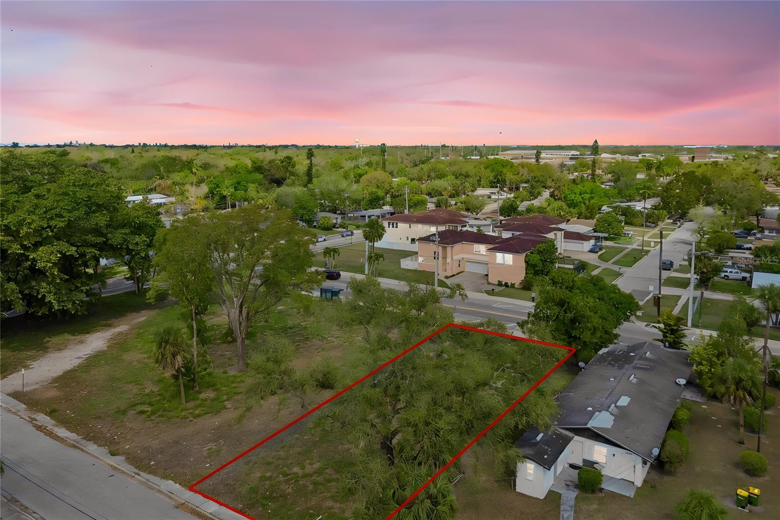 WHAT AN OPPORTUNITY TO OWN A COMMERCIAL LOT in a CENTRALLY LOCATED AREA OF SARASOTA, just MINUTES FROM DOWNTOWN. The lot offers ACCESS FROM TWO STREETS WITH TWO SEPARATE ENTRANCES, providing flexibility when planning future development.

The lot features approximately 7,575 SQ. FT. and is zoned CBN – COMMERCIAL. The current property use is 0010 – VACANT MULTI-FAMILY, offering several possibilities for future use. One potential concept could be building OFFICES OR RETAIL SPACE ON THE FIRST FLOOR WITH APARTMENTS ON THE SECOND FLOOR, creating a mixed-use opportunity. Any building facing MLK must include commercial space on the ground floor.

CONVENIENTLY LOCATED with easy access to major roads, shopping, restaurants, and everyday amenities.

Another benefit is NO HOA AND NO FLOOD INSURANCE REQUIRED, helping keep ownership costs lower.

SURVEY AVAILABLE.

Short-term rentals are not permitted. Buyer is responsible for verifying all BUILDING REQUIREMENTS, ZONING REGULATIONS, AND DEVELOPMENT POSSIBILITIES WITH SARASOTA COUNTY.