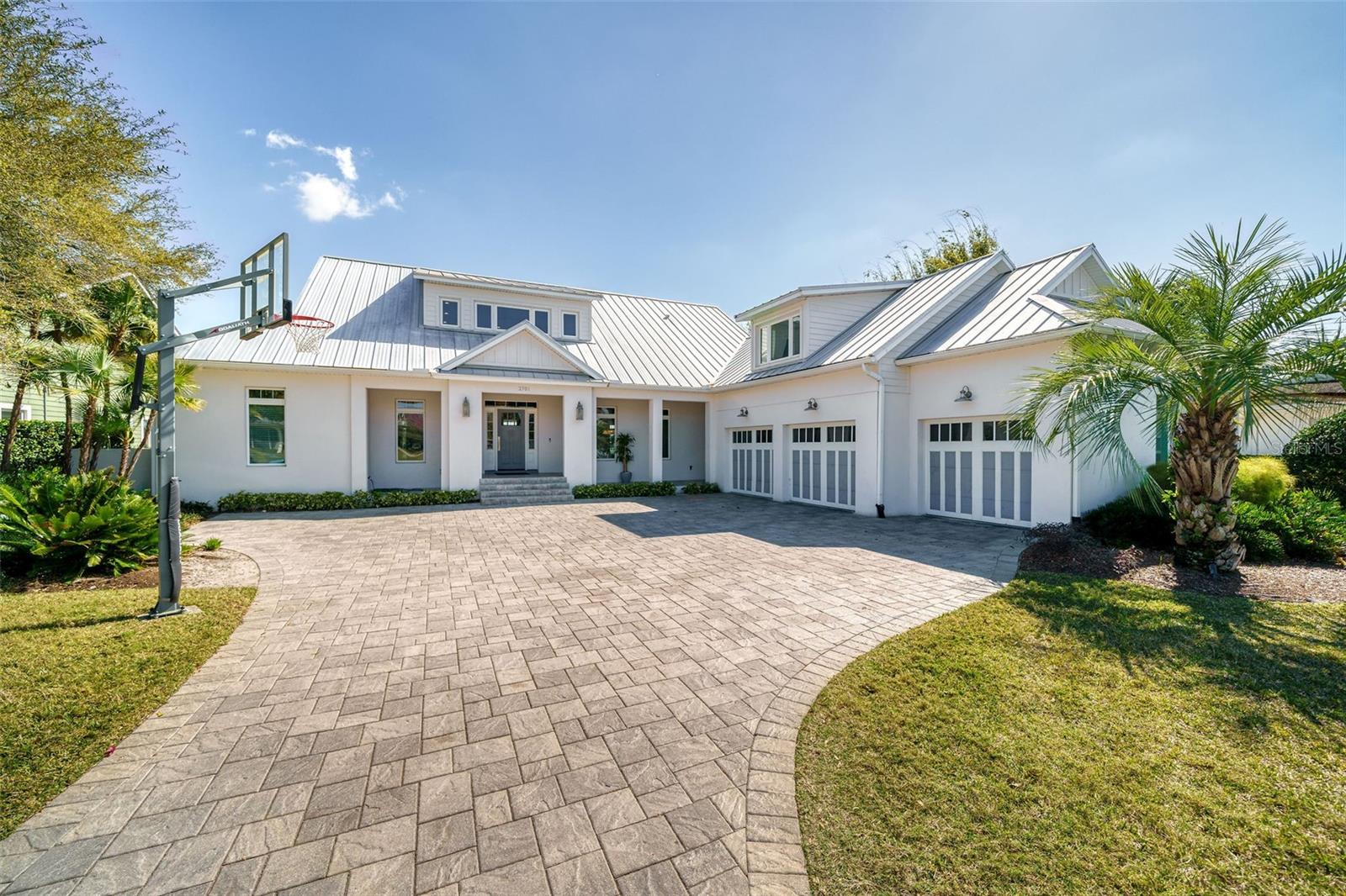 Welcome to your DREAM LAKEFRONT LIVING in College Park! This Stunning Newer Home offers 5 bedrooms, 6 baths, over 5,000 sq. ft. and PANORAMIC WATER VIEWS. Enjoy Spacious Living Areas, a Gourmet Kitchen with High-end appliances, and a Luxurious Downstairs Master Suite. Plenty of upstairs space with a Loft and a HUGE Bonus Room for added entertainment! Entertain guests in the Backyard Oasis with a Sparkling Swimming Pool and Private Dock with Breathtaking Sunsets. Edgewater Drive Shopping, Dining, and Entertainment just blocks away!!! Don't miss this opportunity for luxury lakeside living in the heart of Central Orlando!!!