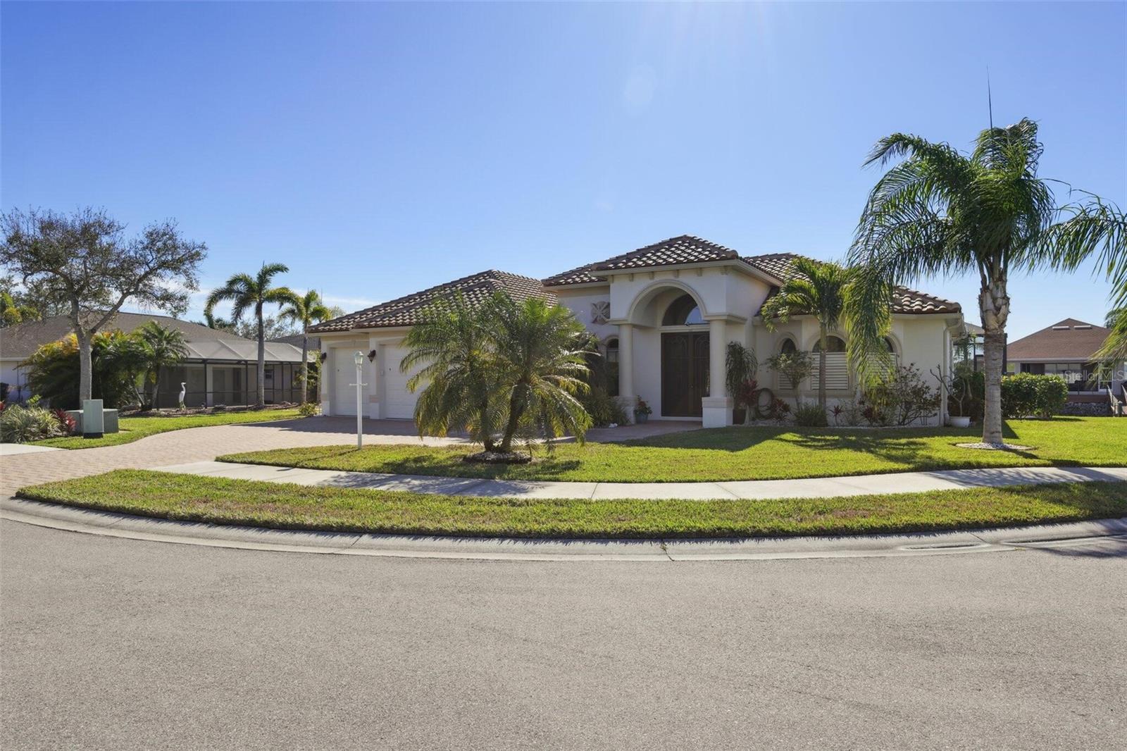 Beautiful 3 bedroom, 3 bath, 3 CAR GARAGE + office on the island of Duck Key in North Port. This home is on a WATER FRONT CANAL with DOCK & BOAT lift having direct access to the Myakka and the Gulf of Mexico. The home is open concept with split floor plan and WATER VIEWS!  The gormet kitchen is as inviting as it is spacious! The kitchen features granite counter tops, solid wood cabints, reverse osmosis water system, large walk in pantry, SS appliances, bar counter, large island, & breakfast area.  The primary master has sparkling WATER & POOL VIEWS, soaring catherdral ceilings with double tray crown molding, and two walk in CUSTOM DESIGNED closets. Your luxurious private bath has a walk thru Roman shower, dual granite vanities as well as a soaking tub. Additionally, there are two spacious bedrooms, each having a bath. One bedroom has a water view and the bath has pool access and a water view.  The lanai expands the home into an entertainers dream!  Starting with the sliding pocket doors that lead onto sealed brick pavers. There's a complete Master Forge kitchen! The OUTDOOR KITCHEN features a granite counter tops, griddle, gas burners, grill, sink and brand NEW 2026 refrigerator. The screen enclosed lanai includes BOTH a sun solar and /or electric heated salt water pool & spa! Each has Pebble Tec pool lining. The pool and spa are app automated. All are overlooking the canal where you can view natures finest birds, turtles, jumping fish and perhaps a manatee or alligator! Steps away is a TREX DOCK featuring water and electric, plus a 10,000 LB boat lift and direct access to the Myakka River and the Gulf of Mexico.
This home also has owner OWNED 20 electric Solar Panels to significantly reduce your electricity bill! The home also boasts a NEW TILE ROOF and EXTERIOR PAINT in 2023, brand NEW HVAC unit in 2024, BRAND NEW 2026 lanai screens and newer pool equipment. A NEW spa pump was installed in 2025. The EXTENDED paver drive has additional parking. Also, worth mentioning is an automated lawn irrigation sysytem, newer stove top & diswasher in 2023, built in garage cabinets, salt water system, and security system. 
Minutes away is Wellen Park, offering waterfront dining, boutique shopping, live music, weekly events and a splash pad. Also, available is Cool Today park with Braves spring training stadium and Charlotte Sports Park hosting the Tampa Bay Rays for spring training. North Port has access to great medical care. Sarasota Memorial Health Care Cente and ER are minutes away. North Port is currently undergoing the construction of a new top-tier 100 bed hopital.
The HOA is low AT $700/year and NO CDD!! This home has NEVER had flood damage! Duck Key has all electric lines underground. What are you waiting for? This is everything you've dreamed of!!