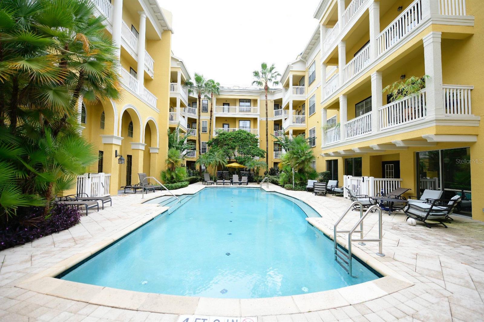 Welcome to Unit 213, a charming 2-bedroom, 2-bathroom condo located in the heart of Downtown Orlando. This well-maintained unit features hardwood floors throughout, a spacious open layout, and a private balcony perfect for relaxing outdoors. The kitchen offers ample counter space and flows seamlessly into the living area, making it ideal for everyday living or entertaining. The community offers a resort-style pool, fitness center, clubhouse with billiards, and beautifully landscaped grounds. Small pets are welcome, and the unit includes an assigned parking space. This is also a great investment opportunity — the property is currently rented to long-term tenants who have expressed interest in continuing their lease. Just minutes from Lake Eola, Thornton Park, and top dining and entertainment, this condo blends comfort, convenience, and prime location.