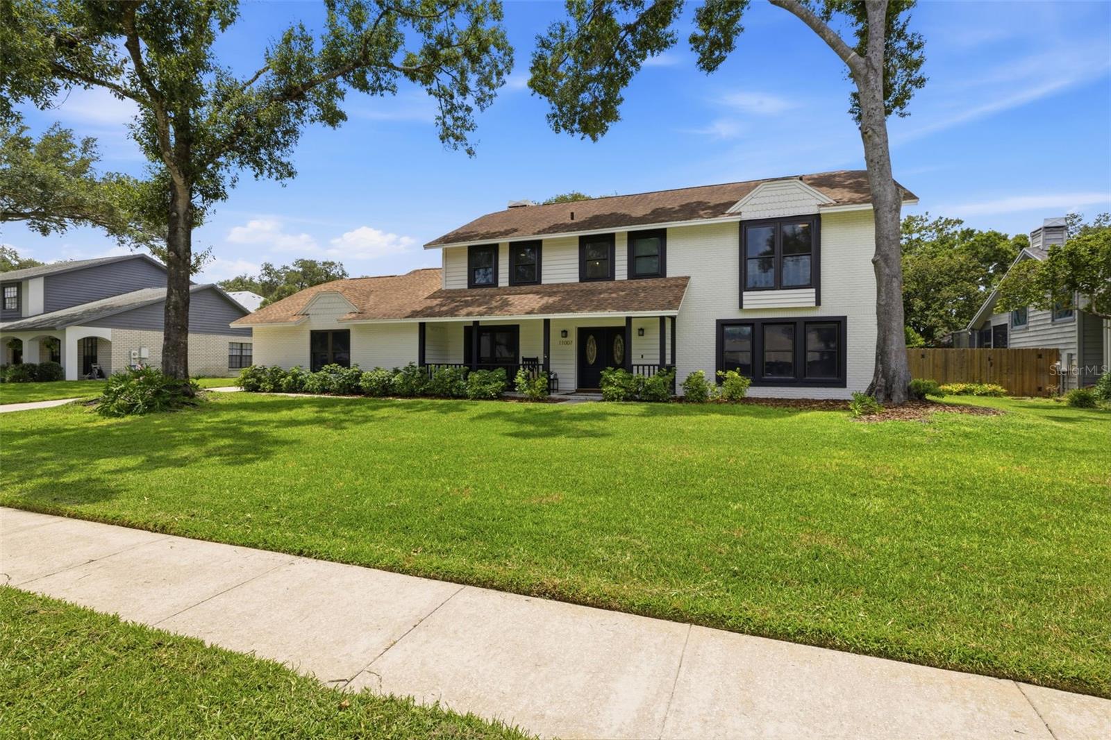 Welcome to this exceptional 4 bedroom, 3 bathroom pool home nestled in the heart of Temple Terrace, where timeless design, incredible living spaces, and resort style outdoor living come together. From the moment you arrive, you'll be impressed by the impeccable landscaping, mature trees, and expansive covered front porch that creates a warm welcome and the perfect place to relax and enjoy the neighborhood. Inside, you'll find a spacious and thoughtfully designed floor plan with room for everyone. The home features two generous living areas, including a cozy family room centered around a beautiful wood burning fireplace, as well as a formal dining room that's perfect for hosting holiday dinners and special occasions. Large windows throughout fill the home with natural light, creating a bright and inviting atmosphere. The chef's kitchen is designed for both everyday living and entertaining, offering high end appliances, abundant cabinetry, generous counter space, a massive walk in pantry, and a spacious eat in dining area overlooking the backyard. Open the double French doors and discover the true centerpiece of this home. The backyard is an entertainer's dream and a private outdoor oasis designed for year round Florida living. A stunning custom pool with elegant fountains serves as the focal point, creating a peaceful resort like setting. The expansive covered outdoor living area provides the perfect space for everything from barbecues and pool parties to quiet evenings relaxing outdoors. Whether you're watching the big game, enjoying dinner with friends, or simply soaking up the Florida sunshine, this space was designed to be enjoyed. Beyond the pool, you'll appreciate the abundance of green space. The oversized backyard offers endless possibilities with room for outdoor games, gardening, play equipment, pets to roam, or future additions. Beautiful landscaping surrounds the property, providing both privacy and a picturesque backdrop that makes every day feel like a vacation. The first floor also features a versatile guest bedroom that can easily serve as a home office, along with a full bathroom, an oversized laundry room, and an attached two car garage. Upstairs, you'll find two spacious secondary bedrooms, an additional full bathroom, and an incredible primary retreat that truly feels like its own private sanctuary. The oversized primary suite includes a bonus room that is ideal for a home office, nursery, fitness room, sitting area, or creative space. The luxurious ensuite bathroom showcases a spa inspired wet room featuring a freestanding soaking tub, an oversized walk in shower, dual vanities, and a massive walk in closet that offers exceptional storage. Located in one of Tampa's most established and sought after communities, Temple Terrace is known for its tree lined streets, beautiful parks, and convenient location. Residents enjoy easy access to the Hillsborough River, Temple Terrace Golf & Country Club, Lettuce Lake Park, the University of South Florida, Moffitt Cancer Center, AdventHealth, Busch Gardens, and countless shopping and dining destinations. With quick access to I 75 and I 275, commuting throughout the Tampa area is effortless. Offering exceptional indoor and outdoor living, an incredible backyard retreat, flexible living spaces, and an unbeatable Temple Terrace location, this one of a kind home is ready to impress. Schedule your private showing today and experience everything this remarkable property has to offer.