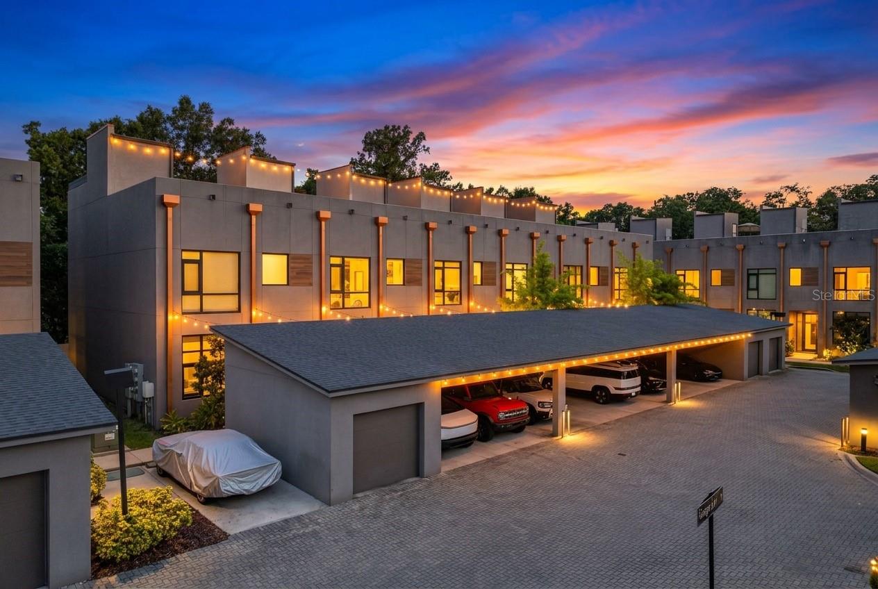 Experience modern luxury in Carrollwood’s most exclusive gated community. This stunning townhome  located in the highly sought after Gauge Line Lofts community is a rare offering, with very few homes becoming available in recent years.
This extensively upgraded three bedroom,  three bath residence blends striking industrial architecture with sophisticated design. Floor-to-ceiling commercial grade hurricane impact glass,  commercial grade hurricane impact glass doors, soaring 12 and 24 foot ceilings, exposed steel beams, and a dramatic spiral staircase create a truly one of a kind living experience.
The light filled open concept floor plan seamlessly connects the living area to a designer kitchen featuring granite countertops, 42" cabinetry, stainless steel appliances, and a brick backsplash. Each spacious bedroom includes its own ensuite bath, including a versatile first floor guest suite or home office. Currently used as a spacious gym. 
Upstairs, the luxurious primary suite offers custom closet systems, dual vanities, and a spa inspired shower. A spacious loft overlooks the main living area, adding flexibility for work, relaxation, or entertaining.
The private rooftop terrace is the ultimate retreat, offering panoramic views, spectacular sunrises and sunsets, and the perfect setting for outdoor entertaining. Additional highlights include a designer brick accent wall, luxury exposed concrete flooring, an upgraded and extended patio deck, one covered carport parking spot, and one additional private parking spot.
Gauge Line Lofts is a hidden gem of fewer than 50 residences, featuring solid block construction, a gated entrance, community pool, and an unbeatable location just minutes from downtown Tampa, Tampa International Airport, premier dining, shopping, and entertainment.
This is more than a home it's a lifestyle.