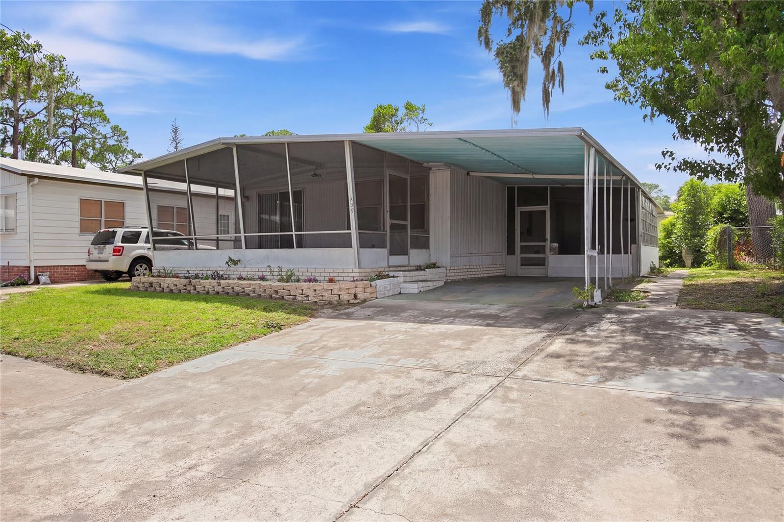 St Johns River Community !!! A very much in demand property due to the convenient BOAT SLIP owned by 110 Maple !! Older home but recently updated. Two spacious bedrooms plus 2 full baths .   Freshly painted interior an new flooring  throughout.  NEW water heater !! Nice front porch plus carport and extra storage .  Ideal property for the avid boater. convenient to I 4 and access to beaches and Walt Disney World !