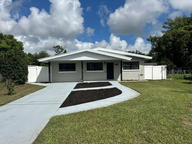 Welcome home to this adorable 2 bedroom/ 1 bath residence, centrally located in beautiful Winter Haven.  Perfect for a first-time home buyer, this charming home offers numerous updates, including a newer metal roof (2023), newer HVAC, complete replumbing (2026), newer vinyl flooring and fresh new interior and exterior paint.  Step outside and enjoy the spacious, fully fenced backyard providing privacy and the perfect retreat for pets, entertaining, or simply relaxing.  Conveniently located just minutes from downtown Winter Haven and the Polk Parkway, with easy access to both Tampa and Orlando.  Don't miss out on a chance to own this charming home.  Schedule your private showing today.