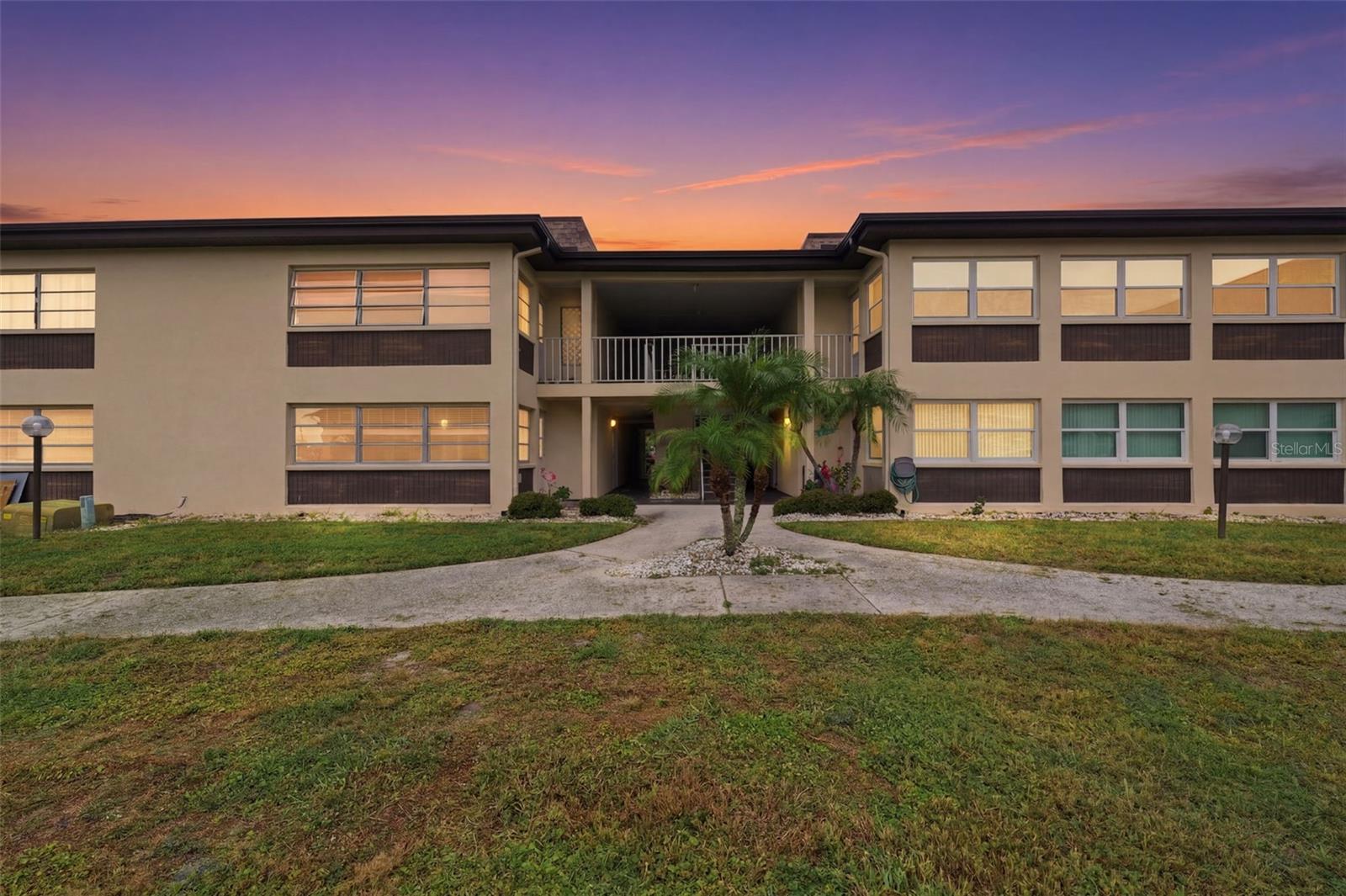 Move-in ready and beautifully updated, this ground-floor end unit in the sought-after Gulf Harbors waterfront community offers the perfect blend of comfort, style, and convenience. With all major updates already completed—including a 2022 roof, 2021 AC and electrical panel, and a full 2025/2026 renovation—you can enjoy worry-free living from day one. Step inside to discover a bright, open layout featuring wood-grain tile flooring, modern soft-close cabinetry, updated countertops, and a full suite of new appliances. The enclosed Florida room now seamlessly expands the living space, creating a versatile area perfect for relaxing, entertaining, or even converting into a second bedroom—complete with a half bath and closet already in place. As an end unit, you’ll appreciate the added privacy and natural light. Outside your door, enjoy a maintenance-free lifestyle with a comprehensive condo fee that covers everything from exterior upkeep to internet, water, sewer, and access to community amenities, including a pool and recreational facilities. For those who love the coastal lifestyle, optional membership to the private Gulf Harbors Beach Club offers exclusive access to sandy shores for just $240 per year. Opportunities like this—updated, flexible living space in a waterfront community—don’t come along often. Schedule your private showing today and see the potential for yourself!
