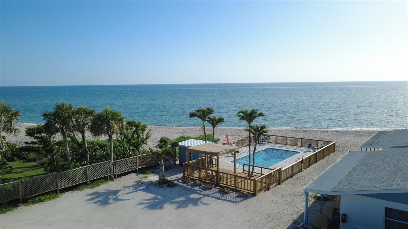 Perfectly positioned on this 11-mile barrier island, this property boasts nearly 100 feet of pristine sandy shoreline along the Gulf, as well as direct access and frontage on the Intracoastal Waterway. The resort features ten units, and eight of them have a fully equipped kitchen, satellite TV, WIFI, and comfortable accommodations for both short and extended stays. Units one and two have not been renovated and will require work for an occupancy permit. All units offer breathtaking views of the beach and pool, while every guest enjoys the convenience of reserved parking, complimentary beach chairs, shell scoopers, and beach and bath towels provided by the resort. These world class amenities create a dedicated following of repeat guests.

Resort amenities include a year-round, temperature-controlled beachfront pool and a private dock on the Intracoastal Waterway, offering guests a tranquil retreat for relaxation, fishing, or dolphin and manatee watching. Seafarer’s carefully maintained policies ensure a peaceful atmosphere with no pets, no parties, and no unregistered guests, making it a highly desirable destination for those seeking a calm and refined experience. The surrounding area enhances its appeal with world-class shelling, fossilized shark teeth, sea turtle nesting, and abundant marine life, while downtown Englewood and Venice—just a short drive away—provide charming shops and dining. With convenient access to regional airports in Punta Gorda, Sarasota, and Fort Myers, this beachfront property combines exclusivity, natural beauty, and strong income potential, making it an extraordinary investment opportunity on Florida’s Gulf Coast.
