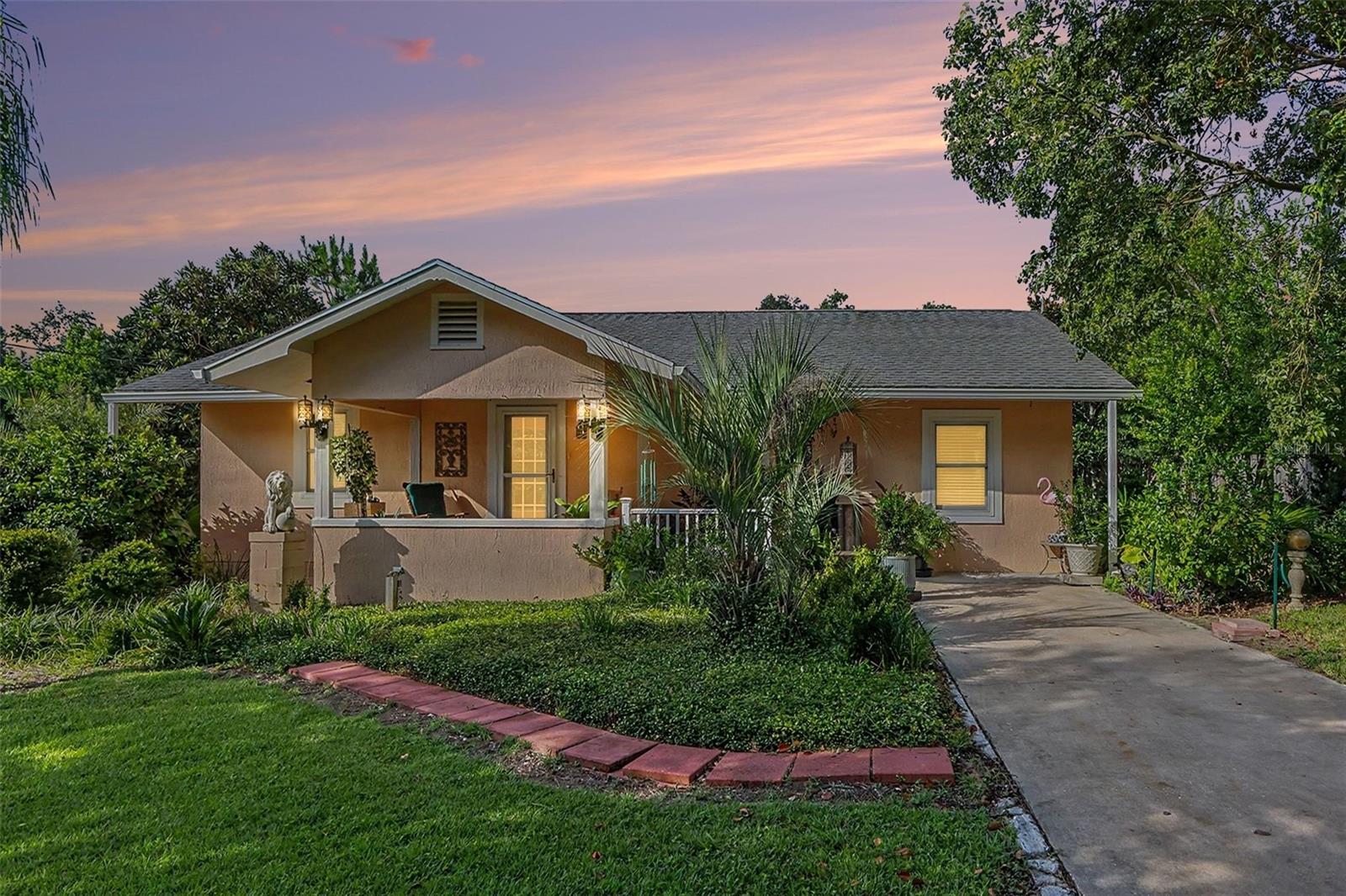 Welcome to this beautifully updated Belleview home situated on a spacious half-acre lot, blending modern updates, privacy, and country charm.

From the moment you arrive, you'll appreciate the incredible backyard oasis featuring a thriving garden, amazing outdoor shower, well-built chicken coop, a shed, and a detached garage ideal for storage, workshops, hobbies, or additional workspace.

Inside, updated energy-efficient windows throughout fill the home with natural light while helping reduce utility costs and improve year-round comfort. The home has been thoughtfully upgraded with electrical and plumbing improvements throughout, two wells including a newer 20 GPM water well that is fully wired, permitted, inspected, and recorded by Marion County, and a newer septic system featuring a 900-gallon concrete tank, drain field, 4-inch PVC lines, and three exterior cleanout traps.

The architectural shingle roof is approximately 12 years old and includes a transferable warranty for added peace of mind. Additional features include full-house rain gutters and beautifully maintained outdoor spaces designed for relaxation and entertaining.

With its large lot, extensive updates, and unique amenities, this move-in-ready property creates a rare opportunity to enjoy a peaceful, sustainable lifestyle while remaining just minutes from shopping, dining, medical facilities, and everyday conveniences. Schedule your private showing today and experience everything this exceptional Belleview property has to share.