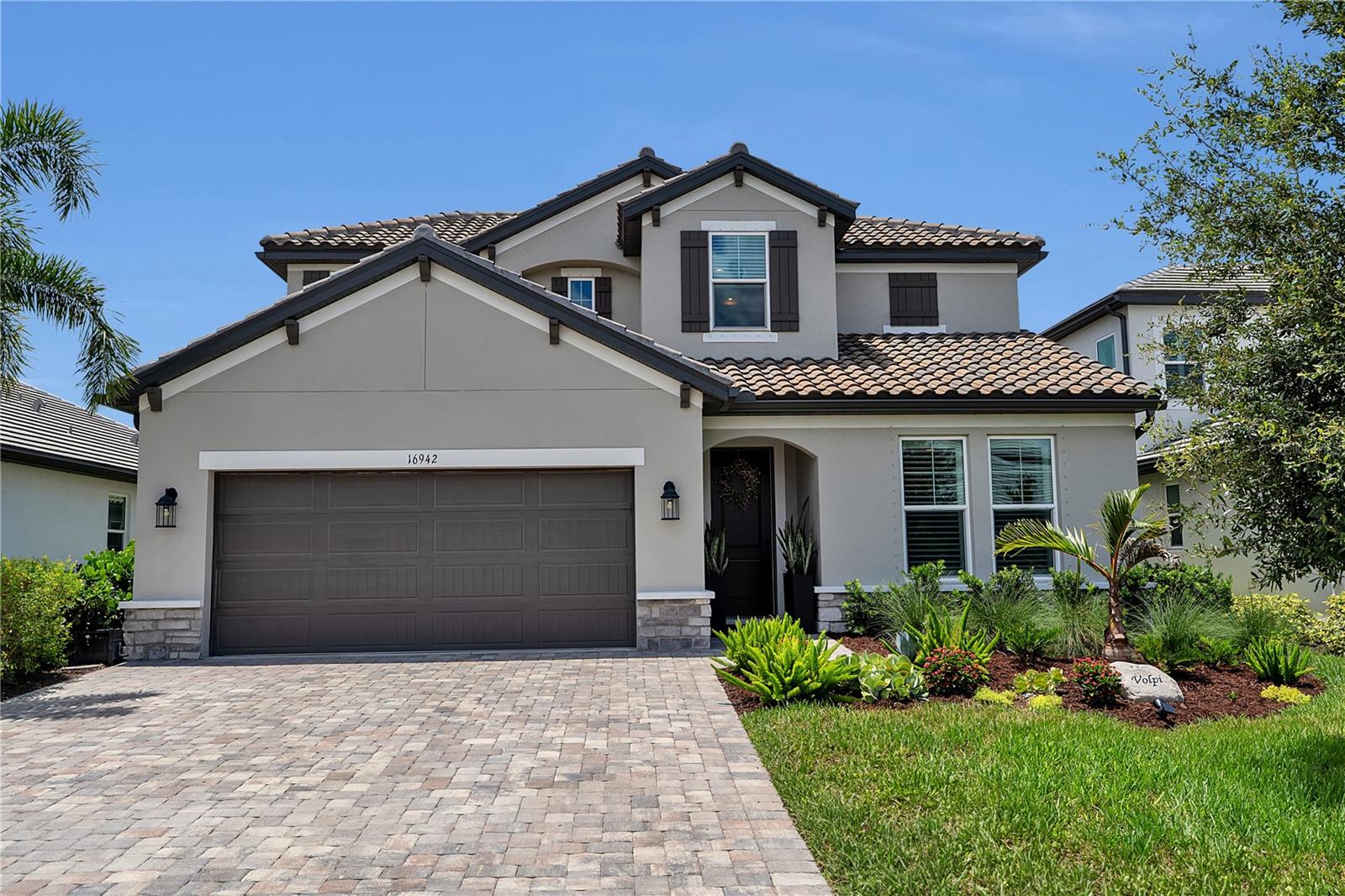 Welcome to this MI Homes Daintree model offering 2,559 sq ft. of well designed living space with 4 bedrooms, 3 bathrooms, a flex room, loft, and a 2-car garage with an expanded driveway. Situated on a preserve view lot, this home features an open-concept floor plan with 8 ft. interior doors, abundant natural light, and a spacious kitchen with large center island, walk-in pantry, and ample cabinet/counter space! The kitchen opens to the dining and living areas, creating a functional layout for everyday living and entertaining. The first floor primary suite includes a walk-in closet, dual vanities and views of the preserve. An additional first-floor bedroom and full bathroom provide flexibility for guests. Upstairs, you'll find two additional bedrooms, a full bathroom, and a versatile loft suitable for a media room, playroom or additional living area. Sliding glass doors lead to the covered lanai overlooking the preserve. The home is conveniently located near the amenity center featuring a resort style-pool, fitness center, clubhouse, pickleball courts, basketball court and playground. The builder's final phase of development includes planned beach volleyball courts and additional open green space for outdoor recreation. Take a visit to one of Lakewood Ranch's most loved communities. Zoned to the NEW Lake Manatee k-8 School and the NEW AAA High School currently being built.
