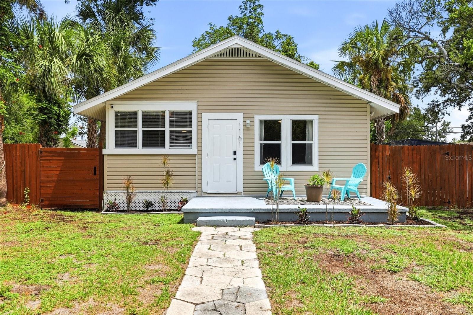 This 2 bedroom, 1 bathroom bungalow blends original details with thoughtful updates, offering comfortable living both inside and out. Natural light pours through an abundance of windows, creating bright, inviting spaces throughout the home.
The updated kitchen with quartz counter tops and even a reverse osmosis faucet, flows into a dedicated dining area and a laundry closet. There is a welcoming front deck, or step outside the back door to enjoy a screened porch, and a generously sized yard with plenty of room to garden, play, or relax beneath the mature trees, including an avocado tree. 
With its functional layout, indoor-outdoor living, and a mix of preserved character and modern updates, this home offers a space that's both distinctive and easy to enjoy. Close to downtown St Pete and just a short drive to beaches, restaurants, shopping and more.