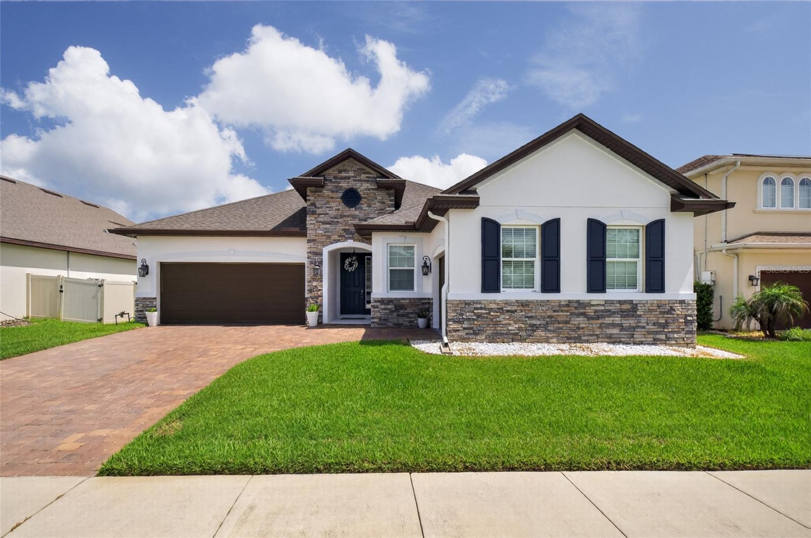 Welcome to 443 Wrangler Road, where comfort, flexibility, and an unbeatable Winter Garden location come together. Nestled in a desirable gated community with very low HOA fees, this beautifully maintained two-story pool home offers the perfect blend of functional living spaces and timeless appeal. Designed with convenience in mind, the primary suite is located on the first floor along with all of the additional bedrooms, creating an ideal layout for everyday living. Upstairs, you'll find a spacious private bedroom with its own ensuite bathroom—a versatile space that can easily serve as a guest retreat, oversized playroom, home office, fitness room, or media room. The freshly painted interior provides a bright, move-in-ready feel, the brand new AC with a 10 year warranty guarantees peace of mind, and the 3-car garage offers plenty of room for vehicles, storage, or hobbies. Step outside to your own backyard oasis featuring a sparkling private pool, perfect for relaxing weekends or entertaining family and friends year-round. Location is everything, and this home delivers. You'll be just 5 minutes from Historic Downtown Winter Garden and Plant Street, where you can enjoy award-winning restaurants, boutiques, the Saturday Farmers Market, and the West Orange Trail. Plus, Winter Garden Village is only 5 minutes away, offering endless shopping, dining, and entertainment options. If you've been searching for a home that offers flexible living spaces, a fantastic pool, and one of Winter Garden's most convenient locations, 443 Wrangler Road is ready to welcome you home!