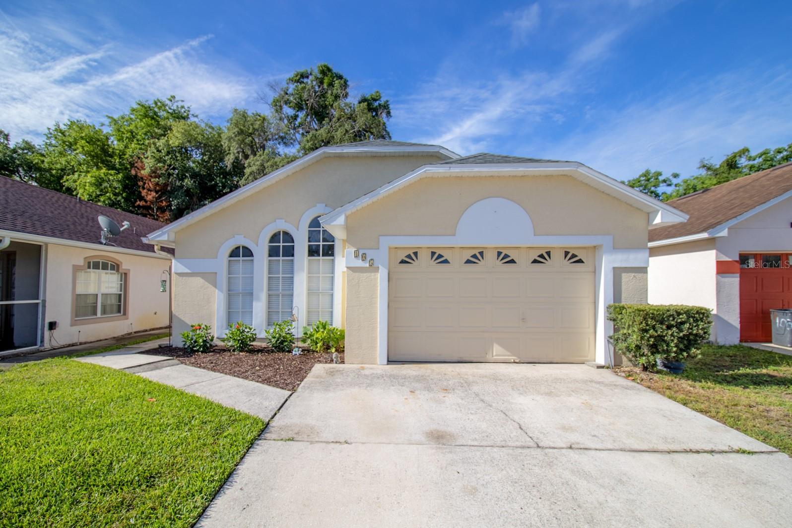 Tucked away in a charming one-street neighborhood with minimal through traffic, this move-in ready Sanford home offers comfort, convenience, and an incredibly functional layout at an affordable price point. With 3 bedrooms, 2 bathrooms, and a 1.5 -car garage, the home is designed for easy everyday living while still offering flexible spaces to fit your lifestyle. One area could easily be transformed into a home office, den, playroom, or hobby space depending on your needs.
At the heart of the home, the spacious family room features vaulted ceilings and an open layout that flows seamlessly into the kitchen, creating an inviting atmosphere for both relaxing and entertaining. Double doors lead out to the screened porch overlooking the fenced backyard — the perfect setup for morning coffee, weekend BBQs, pets, or simply enjoying Florida living year-round.
The primary suite offers a peaceful retreat with a spacious walk-in closet and an en suite bath complete with double vanities, a soaking tub, and shower.
Beyond the home itself, the location is hard to beat. Enjoy quick access to 417, making commuting across Central Florida incredibly convenient. You’ll also be less than 10 minutes from shopping, dining and entertainment, including Heathrow’s Colonial Town Park and Downtown Lake Mary, while Historic Downtown Sanford’s restaurants, breweries, waterfront, and events are just a short drive away. Plus, the home is zoned for Seminole County’s top-rated schools and features a very low HOA fee. The owners are providing a $3,000 carpet allowance.