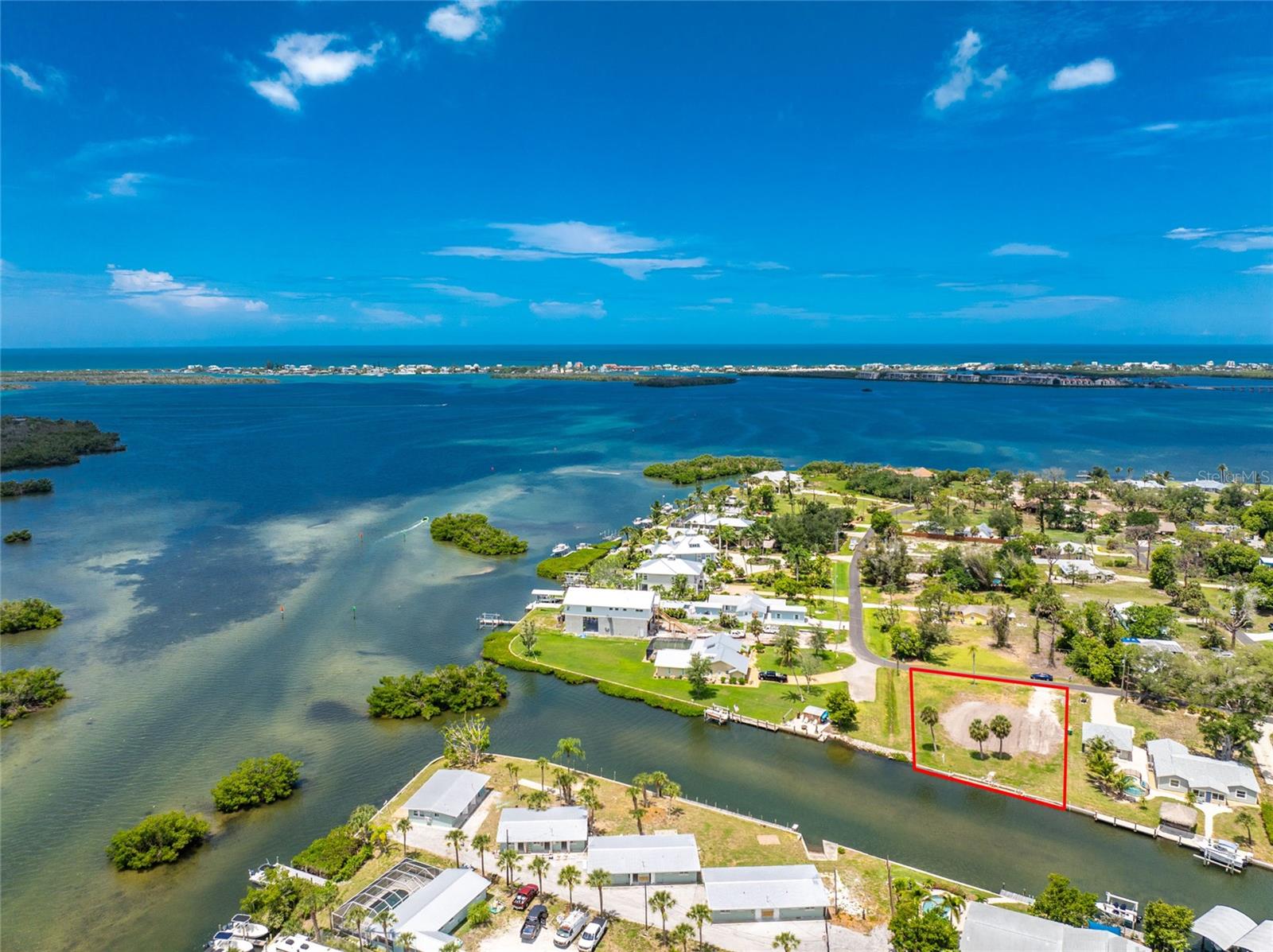 Waterfront Canal Property with No Bridges to the Gulf! Welcome to this rare opportunity in Englewood. This oversized one-third acre lot sits on a deepwater canal with direct access to Lemon Bay and the Gulf, with no bridges to slow you down. Tucked in a quiet neighborhood less than three miles from Englewood Beach, this location offers easy access to local restaurants, tiki bars, boat ramps, kayak launches, and some of the area’s best fishing, all just a short drive away. For those who love to stay active, this location is just minutes from the expansive Ann and Chuck Dever Regional Park, featuring over 300 acres of outdoor recreation. Enjoy access to a heated competition pool, fitness center, multi-purpose gym, and a community garden. You’re also close to the scenic Oyster Creek Waterfront Trail, which links to Cedar Point Environmental Park, perfect for nature walks and wildlife viewing. Golf courses, pickleball and tennis courts, and additional parks are all conveniently nearby. Whether you're planning to build new or invest in a valuable piece of waterfront land, this property offers endless potential. Don’t miss your chance to view 1899 Riverside Drive in Englewood, schedule a private showing today.