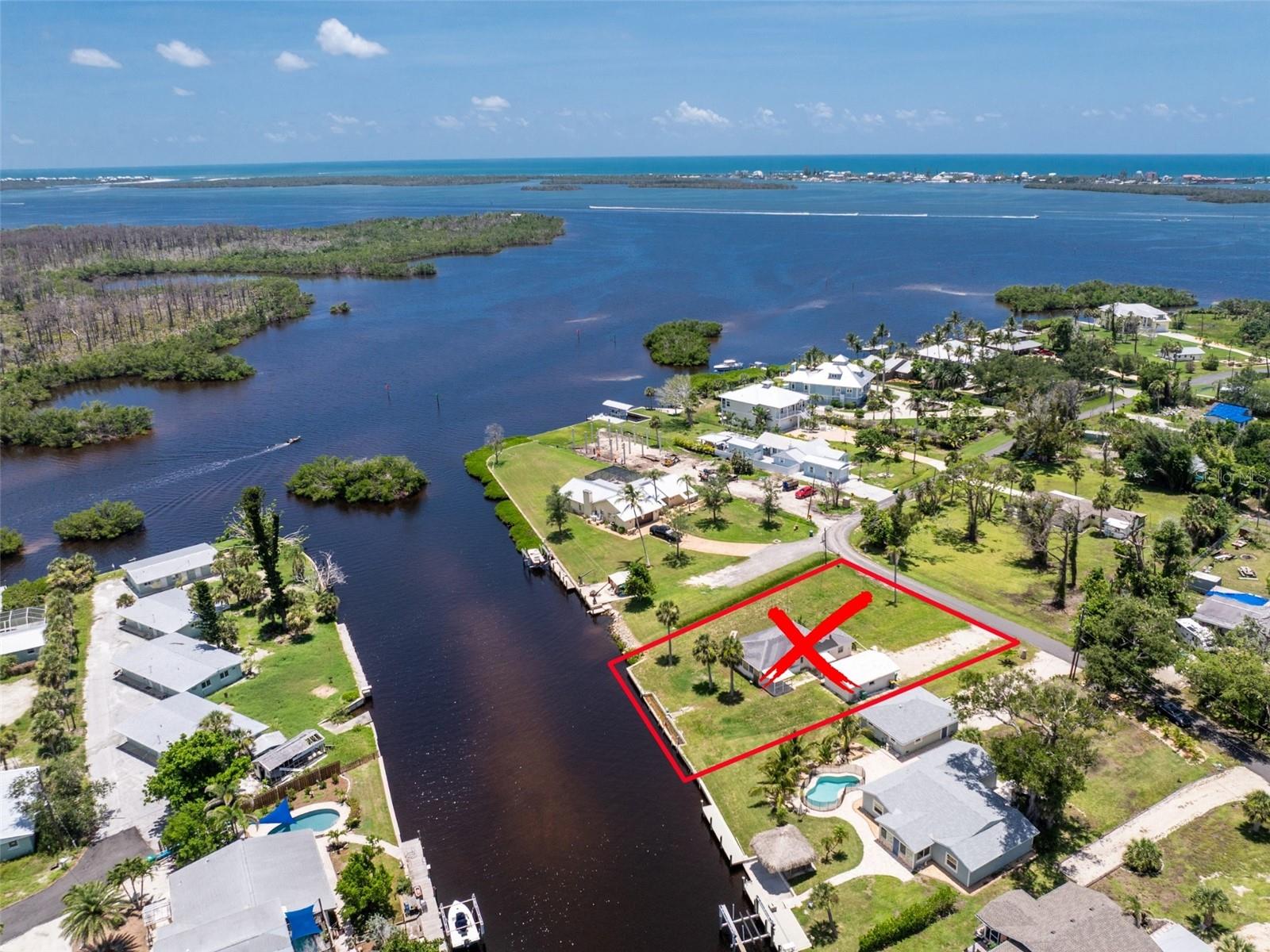 Waterfront Canal Property with No Bridges to the Gulf! Welcome to this rare opportunity in Englewood. This oversized one-third acre lot sits on a deepwater canal with direct access to Lemon Bay and the Gulf, with no bridges to slow you down. The existing block home and detached garage are both scheduled to be demolished and removed within the next two weeks, creating a prime vacant waterfront lot ready for your future plans. Demo permits have already been issued, making this an exciting opportunity for buyers looking to build a custom coastal home in a sought-after boating location. The property is being sold for land value with plenty of space to create something special. Tucked in a quiet neighborhood less than three miles from Englewood Beach, this location offers easy access to local restaurants, tiki bars, boat ramps, kayak launches, and some of the area’s best fishing, all just a short drive away. For those who love to stay active, this location is just minutes from the expansive Ann and Chuck Dever Regional Park, featuring over 300 acres of outdoor recreation. Enjoy access to a heated competition pool, fitness center, multi-purpose gym, and a community garden. You’re also close to the scenic Oyster Creek Waterfront Trail, which links to Cedar Point Environmental Park, perfect for nature walks and wildlife viewing. Golf courses, pickleball and tennis courts, and additional parks are all conveniently nearby. Whether you're planning to build new or invest in a valuable piece of waterfront land, this property offers endless potential. Don’t miss your chance to view 1899 Riverside Drive in Englewood, schedule a private showing today.
