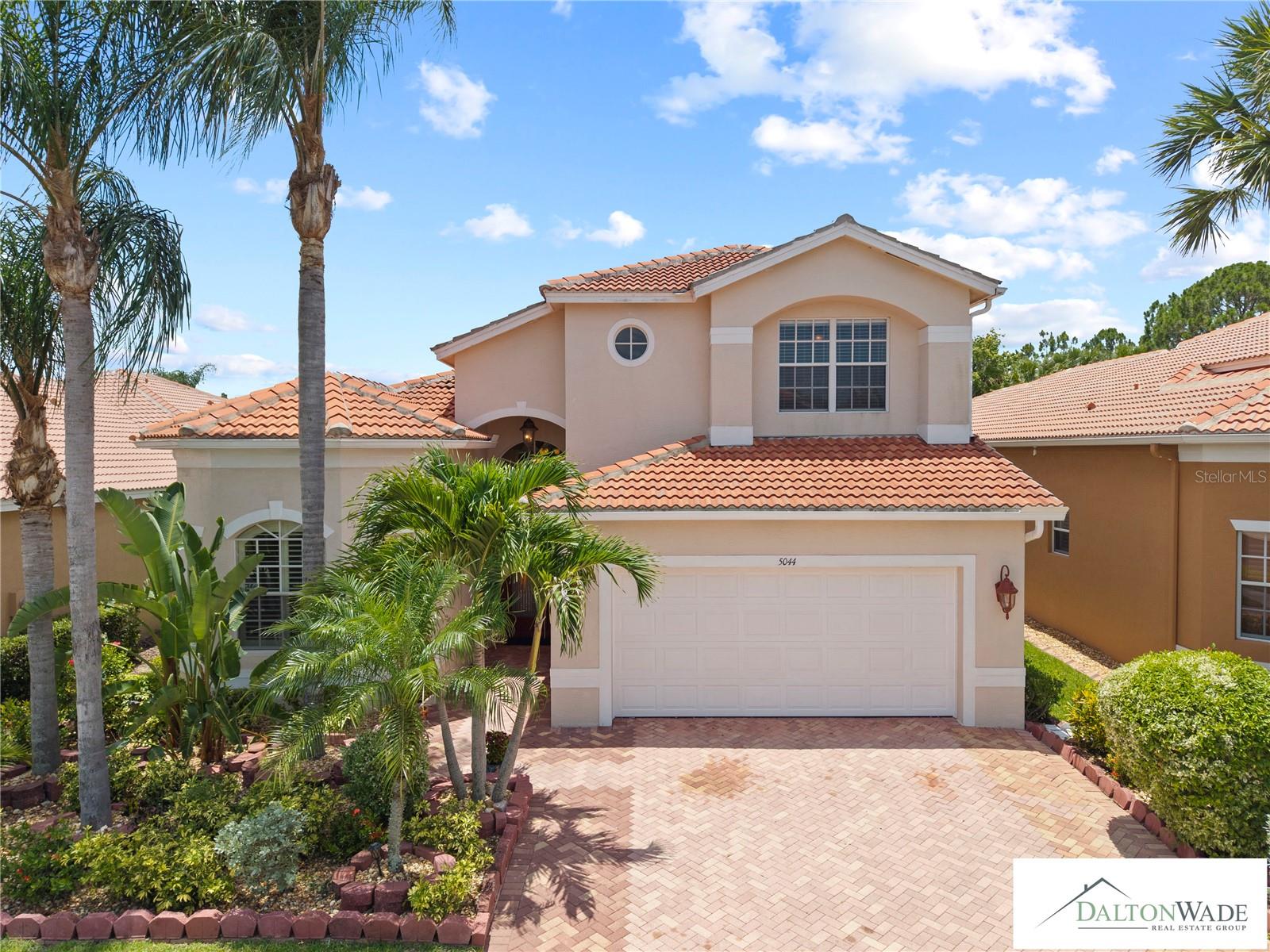 This home is the missing piece to anyone who worked hard in order to have the lifestyle they desired. This 4-bedroom plus bonus room, 3-bath home has everything one can ever ask for in a great home. The patio (lanai) has been widen to well over 1000 sqft. There is a split dining and living room. This 55+ resort-style community was thoughtfully designed for ease, elegance, and peace of mind. 
This is a 2799 sqft home in a very quiet community, making it arguably the most spacious house on that street. The multipurpose den is ideal for a guest or office. House is not in a flood zone.
Immediately upon approaching the house, you will experience the aesthetic landscaping and the curb appeal. Upon entry to the house, you will experience the luxury starting with the open foyer, the high ceilings with the chandeliers and fans hanging from above.
Most of the appliances are fairly new: refrigerator, stove, dishwasher, microwave. Air conditioners and wahter heater have been replaced recently. The lanai is the ideal place to enjoy your morning coffee or host your guests for a get-together or a cook-out and enjoy peaceful Florida sunshine and its beauty. The spa-inspired garden bath tud invites relaxation with along with a walk-in shower. The large laundry room with sink and storage cabinets and shelves further provides the comfort of doing laundry at home. This house will not have any difficulty to pass inspection for it has been well maintained by the owner. Owning a home in this community means more than just owning a home; rather, it is about being part of a vibrant, but quiet communty, active lifestyle. As stated above, you will enjoy a 40,000-square-foot clubhouse, resort-style pools, a bistro, tennis, pickleball, and basketball, walking paths, and an endless calendar of clubs, social events, live entertainment, and learning opportunities. Other benefits included with your HOA cost are lawn care, irrigation, cable TV, internet, and security monitoring so you may focus on what matters most to you: enjoying life and focusing on your personal and professional endeavors. This isn’t just a home. It is a lifestyle. Schedule your showing today and experience why so many taxpayers have already called Valencia Lakes their home.
To recap: Amenities include a 40,000 square foot clubhouse, tennis, pools, a sauna and Spa room, a gym, a health club, pickleball, ping pong, a basketball, softball, a restaurant for members' convenience, pool tables, internet, cable TV, lawn care and exterior maintenance. This house won't last. Seller is motivated.