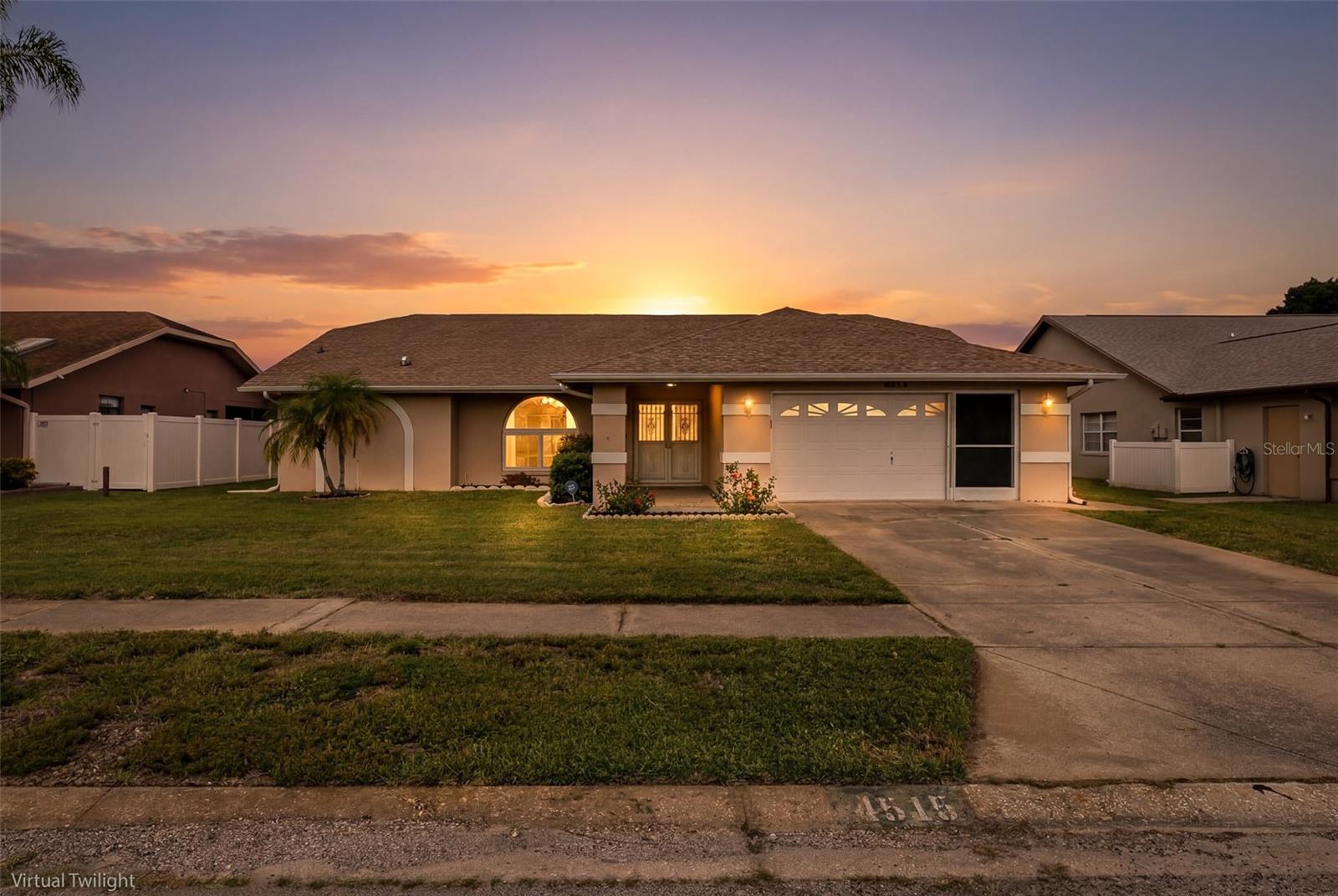**Beautifully Updated 3-Bedroom Pool Home in the Highly Desirable Trinity Area!**

Welcome to this move-in-ready 3-bedroom, 2-bath pool home featuring an open floor plan, vaulted ceilings, and an ideal layout for both everyday living and entertaining. The spacious kitchen offers abundant counter space, a breakfast bar, and opens seamlessly to the main living areas.

The private primary suite includes a custom walk-in closet with built-in shelving, dual sinks, a makeup/vanity area, and a luxurious en suite bathroom with a soaking tub and separate shower. The updated guest bathroom features a modern rain shower head.

This home has been thoughtfully upgraded throughout, including new PGT hurricane-impact, energy-efficient windows, a new PGT hurricane-impact sliding patio door and back door, new flooring throughout most of the home, a new water heater, and a recently replaced pool liner.

Step outside to your own backyard oasis featuring a sparkling pool with a color-changing LED pool light, new outdoor pool surround lighting, a convenient outdoor shower, and a solar pool cover to help maintain water temperature and efficiency. The irrigation system has been upgraded with a Wi-Fi-enabled smart controller and weather monitoring for easy, efficient lawn care.

Additional premium features include:

* Smart home security system and smart thermostat
* Remote-controlled power blinds
* Germicidal air purifier with UV lights installed in the ductwork
* Ceiling fans throughout
* Built-in office cabinetry
* Spacious laundry and storage options

Located in the sought-after Trinity area, this home offers easy access to top-rated schools, shopping, dining, parks, golf courses, medical facilities, and the beautiful Gulf Coast beaches.

This meticulously maintained home combines modern upgrades, smart technology, and resort-style outdoor living—making it a must-see!