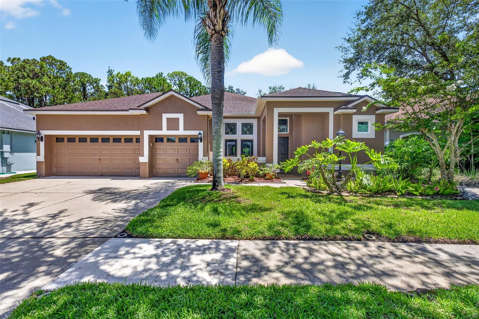 Welcome to 10737 Ayrshire Dr, a beautifully updated 3-bedroom, 3-bathroom home with an office offering 2,357 square feet of living space in one of Tampa's most desirable Westchase neighborhoods.

Step inside to discover a newly painted interior that creates a bright, fresh, and inviting atmosphere throughout the home. The thoughtfully designed floor plan features expansive living and dining spaces, generously sized bedrooms, an office and two and a half bathrooms, providing comfort and flexibility for families and guests alike. This home has been enhanced with valuable upgrades, including all-new hurricane impact windows and doors for added security, energy efficiency, and peace of mind, as well as updated plumbing, offering confidence for years to come. The dedicated laundry area includes a gas dryer hookup for added convenience.

Outside, the 3-car garage provides ample space for vehicles, storage, hobbies, or a workshop, making it an ideal feature for homeowners seeking extra flexibility.

Conveniently located near shopping, dining, parks, top-rated schools, major highways, Tampa International Airport, and downtown Tampa, this home offers the perfect combination of comfort, convenience, and location.

Schedule your private showing today and experience everything this exceptional Tampa home has to offer.