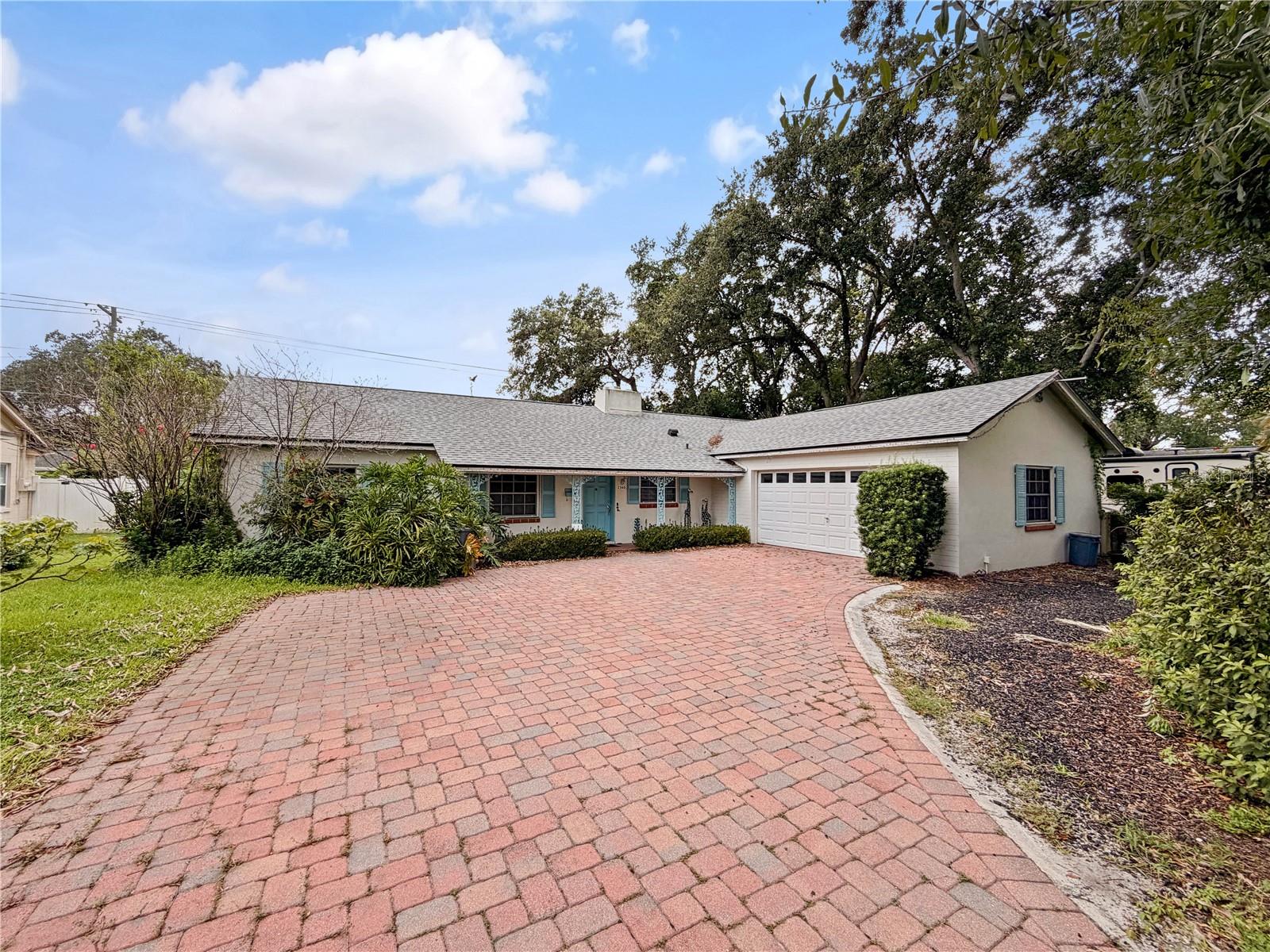 Offered for the first time in 42 years, this well-maintained 3-bedroom, 2-bath home is located in the highly desirable English Estates community in Seminole County. With spacious living areas, quality construction, and timeless character, this home offers a wonderful opportunity to make it your own. A circular driveway provides ample parking with plenty of room for multiple vehicles, including an RV or boat.
Inside, the home features a formal living room with a wood-burning fireplace and traditional mantle. The kitchen includes a cozy eat-in dining area centered around a second wood-burning brick fireplace, while the adjacent family room is filled with natural light from a wall of windows overlooking the backyard.
All three bedrooms are generously sized, including an oversized primary suite with a walk-in closet.
Recent updates include a new roof (2020) and a whole-house generator (2018). Additional features include double-pane windows, a well solely for the sprinkler system, a walk-in attic, attic fan, outdoor shower, and flood lights.
English Estates is one of Maitland's most established neighborhoods, offering Seminole County schools and convenient access to shopping, dining, parks, major roadways, and Downtown Orlando. From this location you are less than 10 minutes to the I-4 Express lanes to get to downtown in 20 minutes total, you are 15 minutes to the hustle and bustle of Winter Park Village and all surrounding shops and restaurants. 
This is a rare opportunity to own a home that has been lovingly cared for and is ready for its next owner.