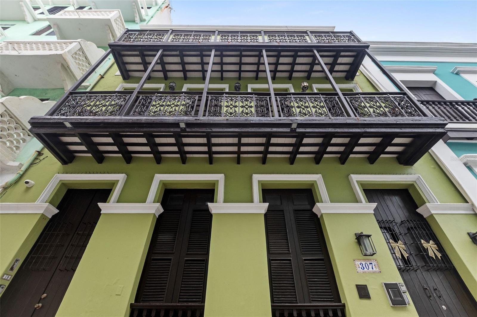 Discover the charm of Old San Juan in this beautiful 2-bedroom, 1-bathroom apartment with cozy living room and dining area.  Completely furnished.  On the second floor of the building. Perfectly located near the beach, this gem offers delightful walks with ocean views and is just steps away from the iconic El Morro and San Cristobal Castles.  Stroll to countless restaurants serving delicious Puerto Rico cuisine, explore unique shops, and soak up the vibrant history that surrounds you.  The San Juan Bay is just around the corner-ready for you to hop on a cruise ship and set sail!  This is more than a home, it's a daily adventure in one of the most enchanting cities in the Caribbean.  Currently operating as an Airbnb, this property generates excellent income - a perfect blend of history, lifestyle, and investment opportunity.
