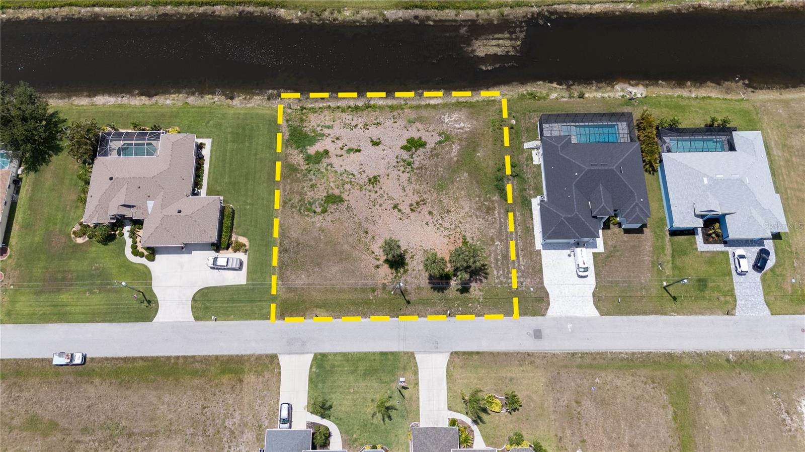 READY TO BUILD YOUR DREAM HOME IN PARADISE???   Hard to find DOUBLE LOT 160' X 120' ON A CANAL "At This Price" in the deed restricted community of Rotonda West.   Almost half an acre property located in Pine Valley. Front of house would face east, and your pool would have sun ALL afternoon & evening. Golf on one of the many golf courses, play tennis, pickleball, or take a walk on the walking trails. Close to shopping, restaurants and a short drive to area beaches! Very few vacant canal double lots available.